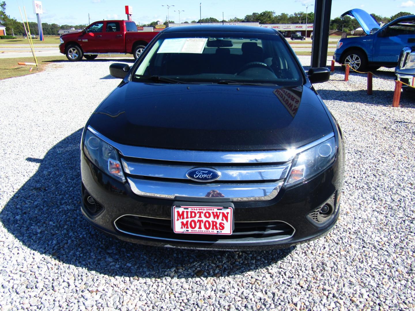 2011 Black /Black Ford Fusion I4 SE (3FAHP0HA2BR) with an 2.5L L4 DOHC 16V engine, Automatic transmission, located at 15016 S Hwy 231, Midland City, AL, 36350, (334) 983-3001, 31.306210, -85.495277 - Photo#1