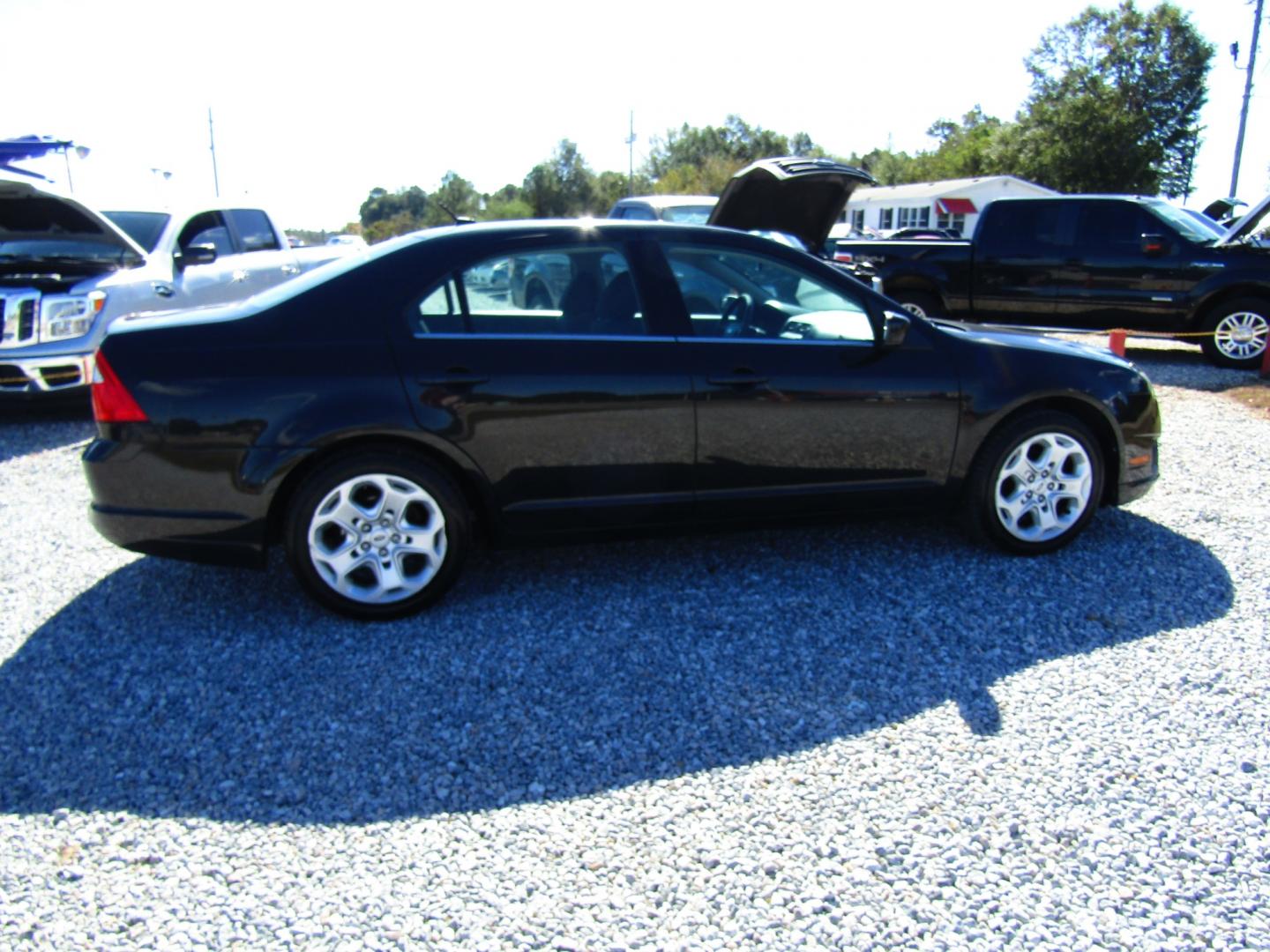 2011 Black /Black Ford Fusion I4 SE (3FAHP0HA2BR) with an 2.5L L4 DOHC 16V engine, Automatic transmission, located at 15016 S Hwy 231, Midland City, AL, 36350, (334) 983-3001, 31.306210, -85.495277 - Photo#7