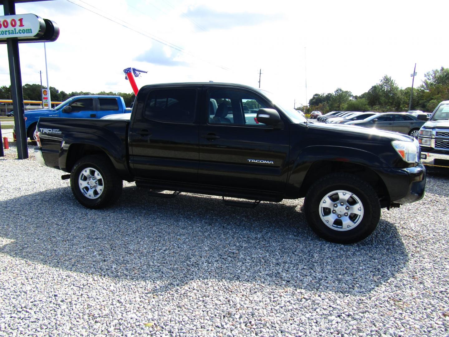 2013 Black /Gray Toyota Tacoma Double Cab V6 4WD (3TMLU4EN0DM) with an 4.0L V6 DOHC 24V engine, Automatic transmission, located at 15016 S Hwy 231, Midland City, AL, 36350, (334) 983-3001, 31.306210, -85.495277 - Photo#0