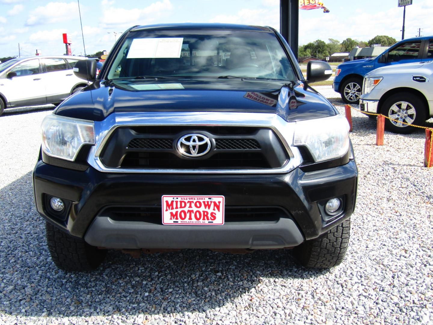 2013 Black /Gray Toyota Tacoma Double Cab V6 4WD (3TMLU4EN0DM) with an 4.0L V6 DOHC 24V engine, Automatic transmission, located at 15016 S Hwy 231, Midland City, AL, 36350, (334) 983-3001, 31.306210, -85.495277 - Photo#1