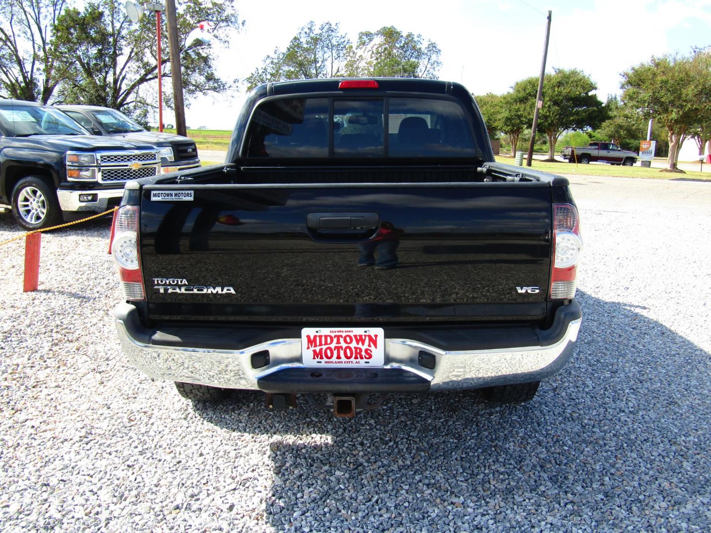 2013 Black /Gray Toyota Tacoma Double Cab V6 4WD (3TMLU4EN0DM) with an 4.0L V6 DOHC 24V engine, Automatic transmission, located at 15016 S Hwy 231, Midland City, AL, 36350, (334) 983-3001, 31.306210, -85.495277 - Photo#6