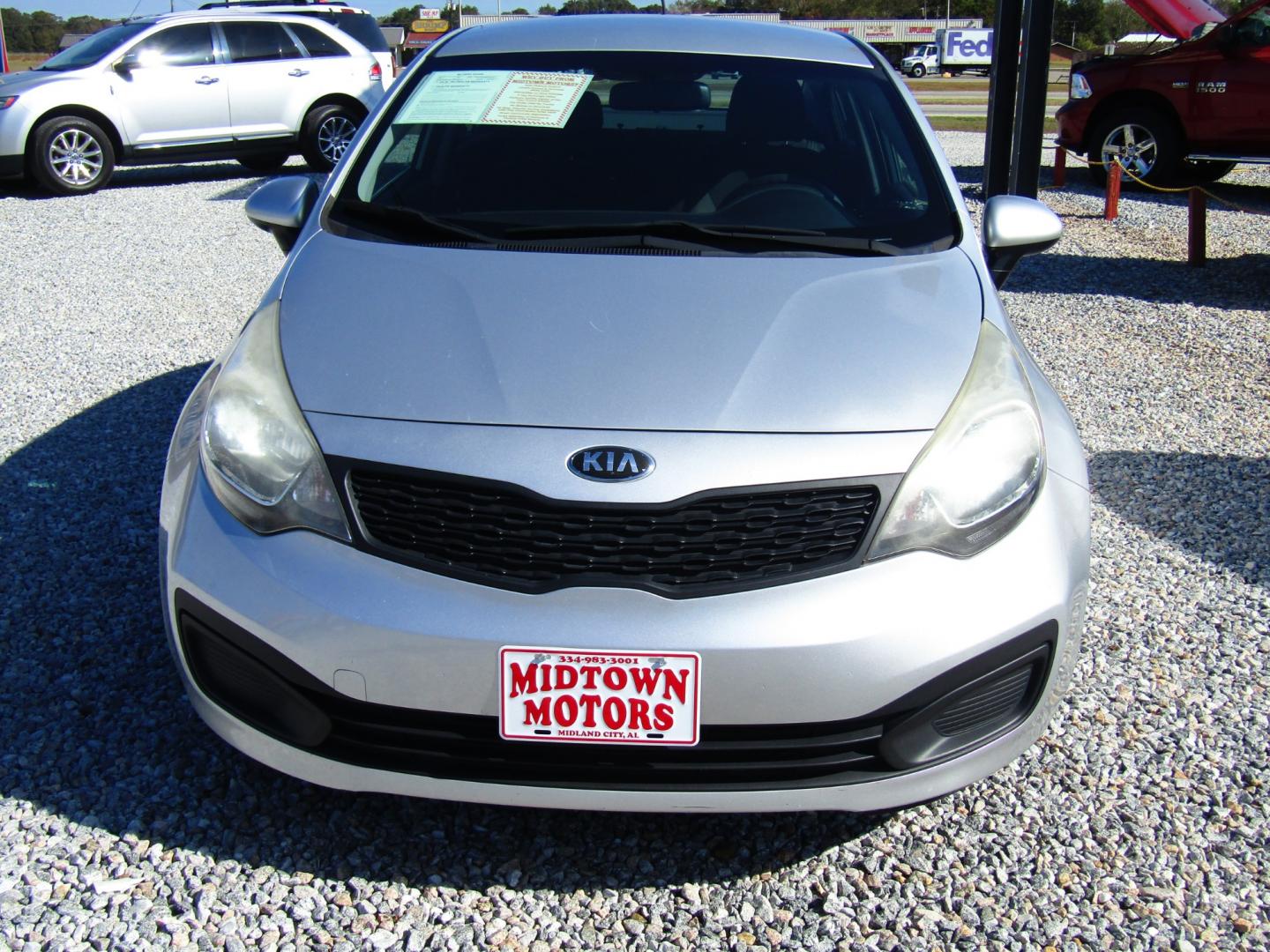 2014 Silver Kia Rio LX (KNADM4A39E6) with an 1.6L L4 DOHC 16V engine, Automatic transmission, located at 15016 S Hwy 231, Midland City, AL, 36350, (334) 983-3001, 31.306210, -85.495277 - Photo#1