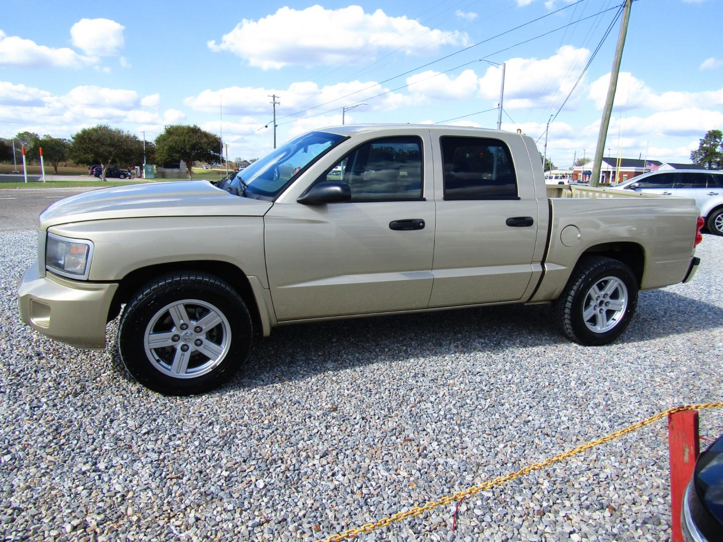 2011 Gold Dodge Dakota SXT Crew Cab 2WD (1D7RE3GK5BS) with an 3.7L V6 SOHC 12V engine, Automatic transmission, located at 15016 S Hwy 231, Midland City, AL, 36350, (334) 983-3001, 31.306210, -85.495277 - Photo#2