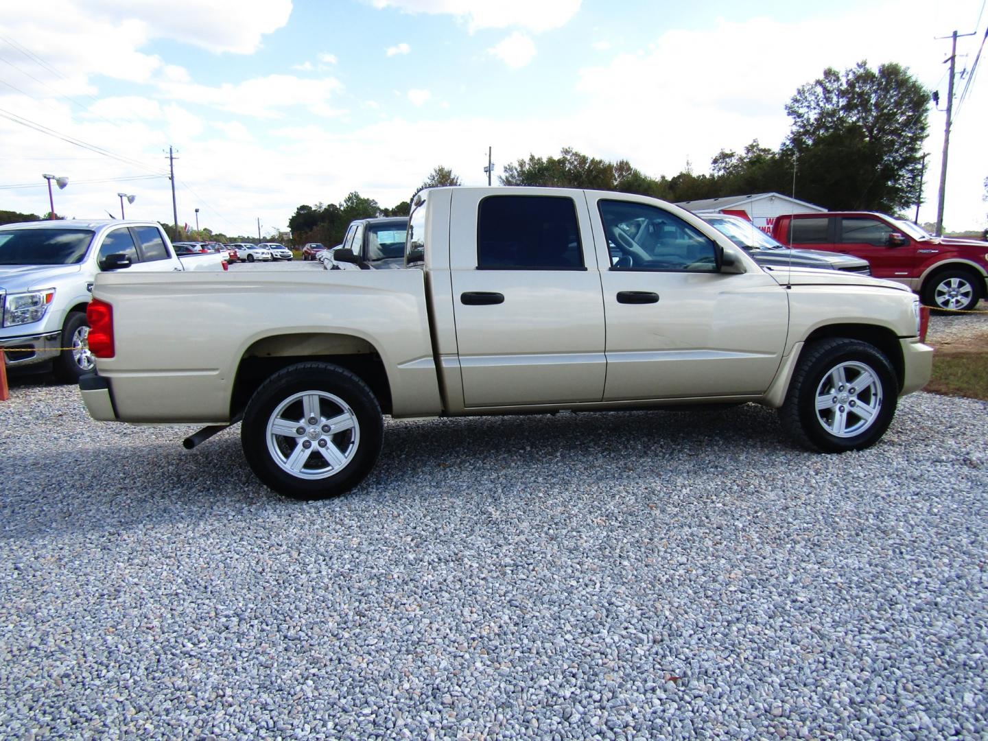 2011 Gold Dodge Dakota SXT Crew Cab 2WD (1D7RE3GK5BS) with an 3.7L V6 SOHC 12V engine, Automatic transmission, located at 15016 S Hwy 231, Midland City, AL, 36350, (334) 983-3001, 31.306210, -85.495277 - Photo#7