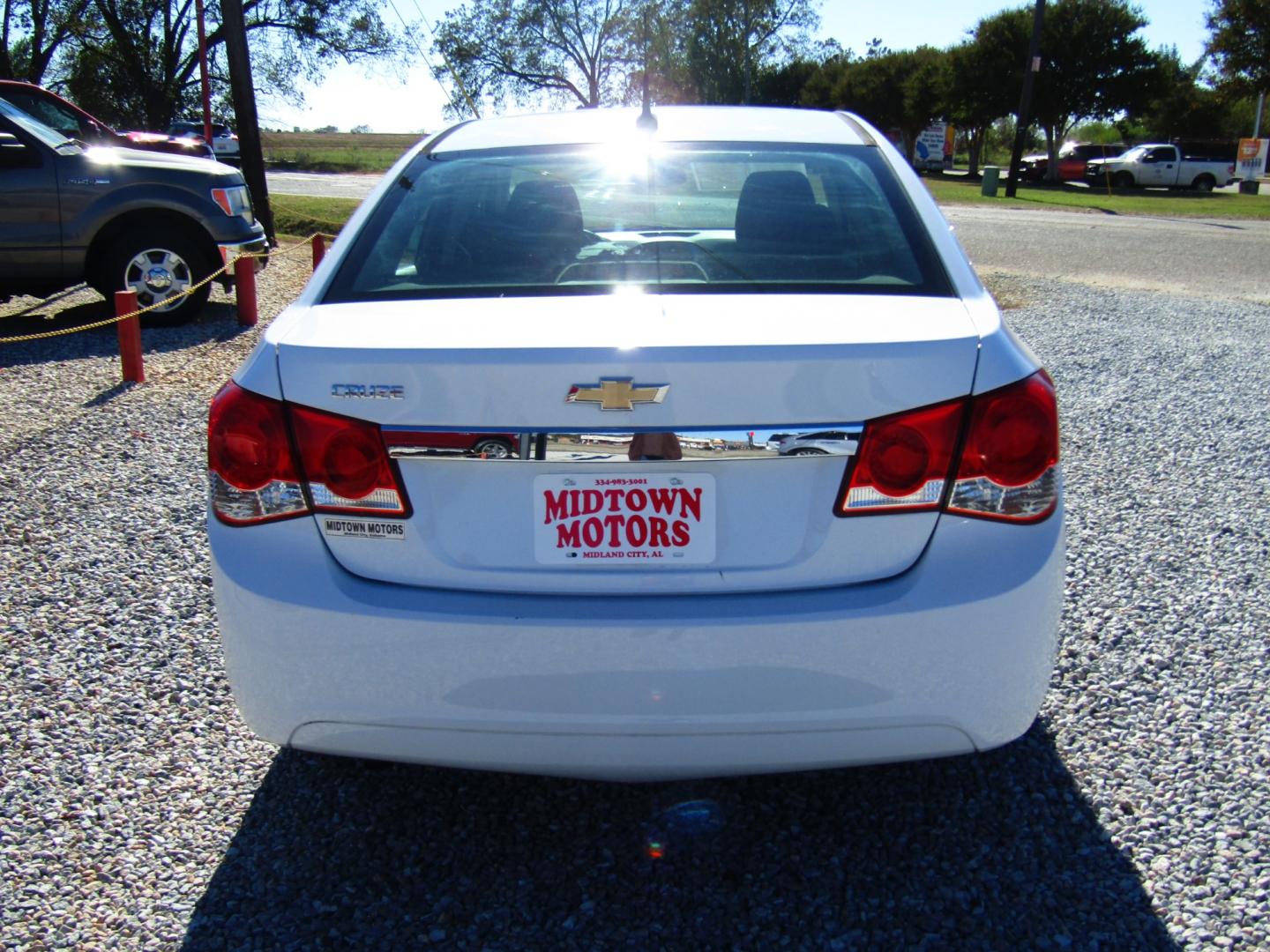 2013 WHITE Chevrolet Cruze LS Auto (1G1PA5SH2D7) with an 1.8L L4 DOHC 16V FFV engine, Automatic transmission, located at 15016 S Hwy 231, Midland City, AL, 36350, (334) 983-3001, 31.306210, -85.495277 - Photo#6