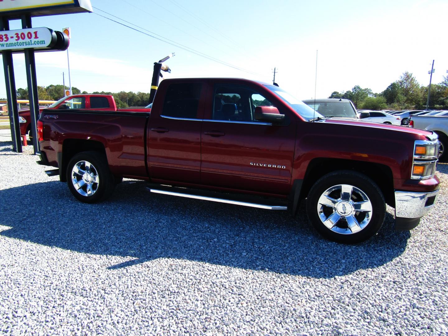 2015 Maroon Chevrolet Silverado 1500 LT Double Cab 4WD (1GCVKREC6FZ) with an 5.3L V8 OHV 16V engine, Automatic transmission, located at 15016 S Hwy 231, Midland City, AL, 36350, (334) 983-3001, 31.306210, -85.495277 - Photo#0