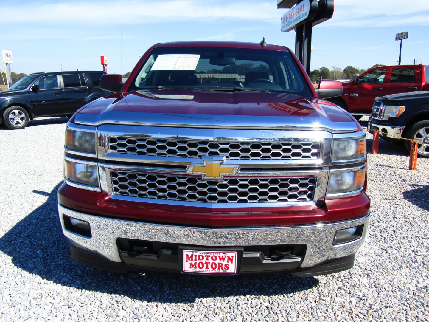 2015 Maroon Chevrolet Silverado 1500 LT Double Cab 4WD (1GCVKREC6FZ) with an 5.3L V8 OHV 16V engine, Automatic transmission, located at 15016 S Hwy 231, Midland City, AL, 36350, (334) 983-3001, 31.306210, -85.495277 - Photo#1