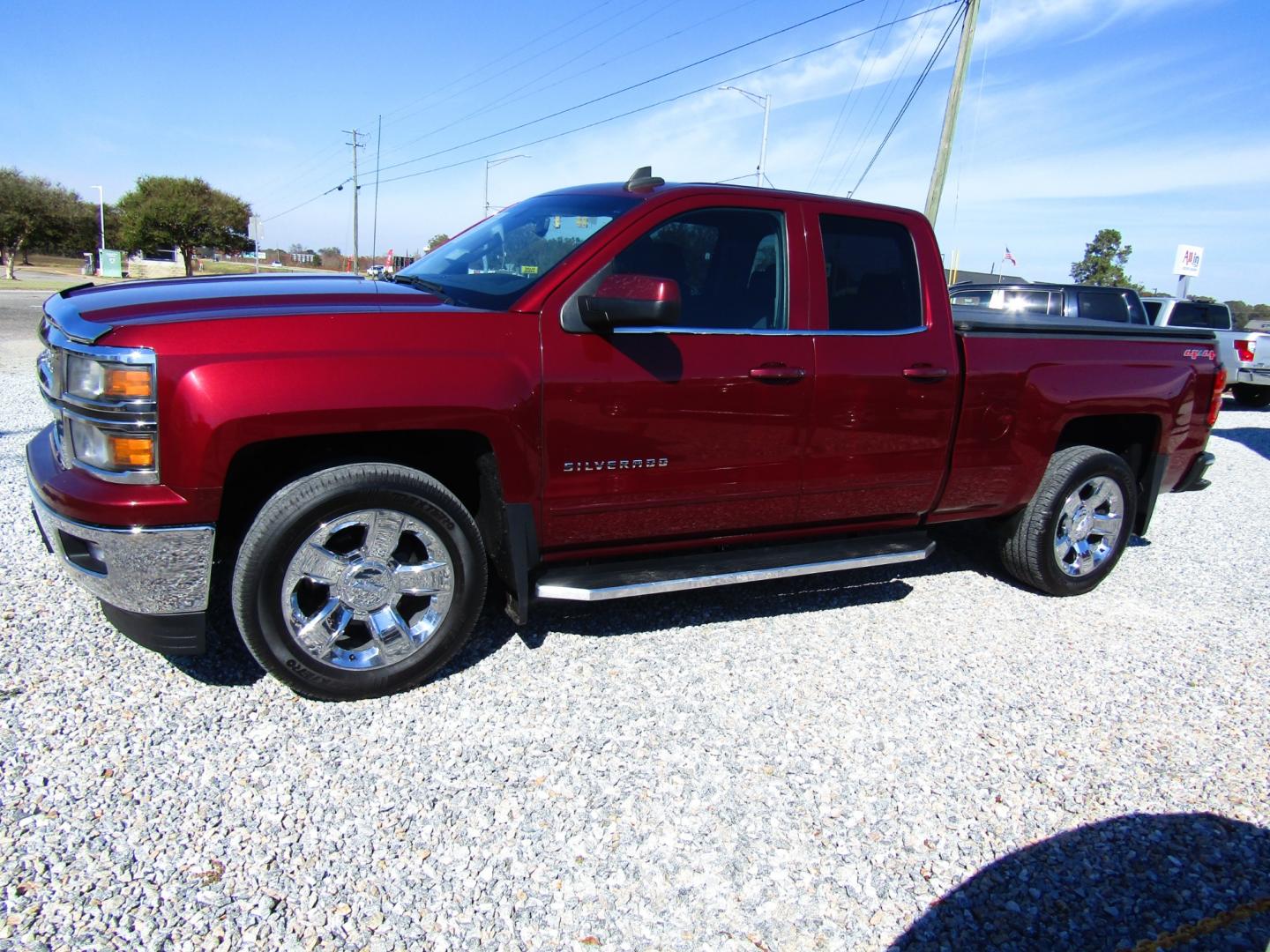 2015 Maroon Chevrolet Silverado 1500 LT Double Cab 4WD (1GCVKREC6FZ) with an 5.3L V8 OHV 16V engine, Automatic transmission, located at 15016 S Hwy 231, Midland City, AL, 36350, (334) 983-3001, 31.306210, -85.495277 - Photo#2