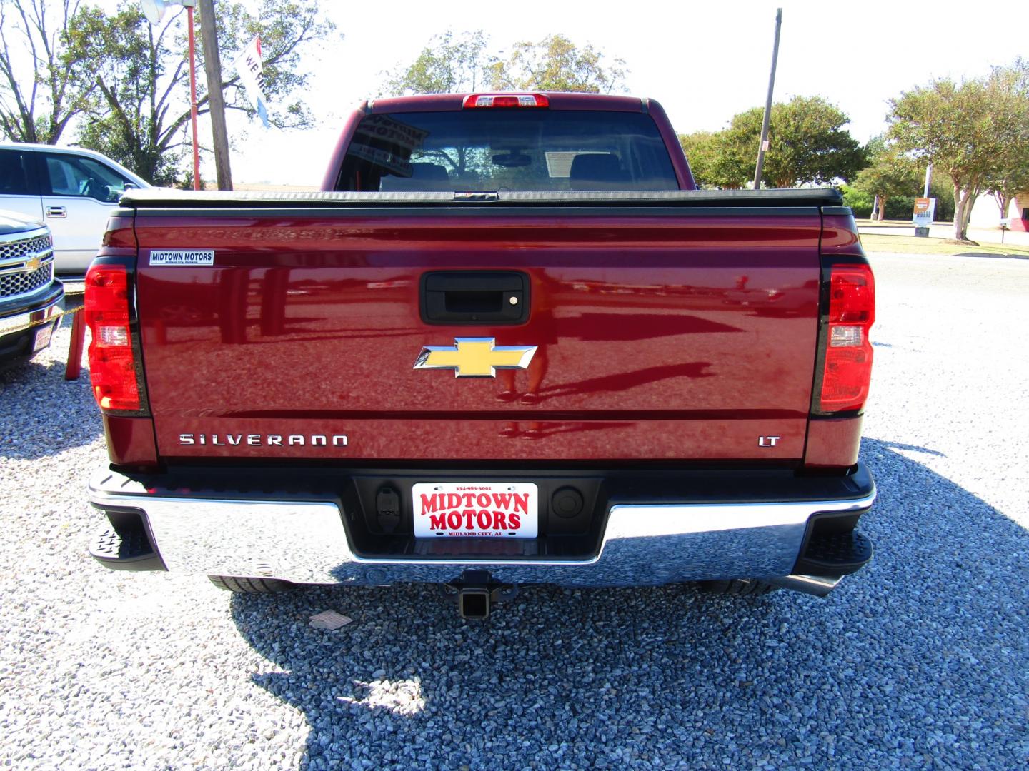 2015 Maroon Chevrolet Silverado 1500 LT Double Cab 4WD (1GCVKREC6FZ) with an 5.3L V8 OHV 16V engine, Automatic transmission, located at 15016 S Hwy 231, Midland City, AL, 36350, (334) 983-3001, 31.306210, -85.495277 - Photo#6