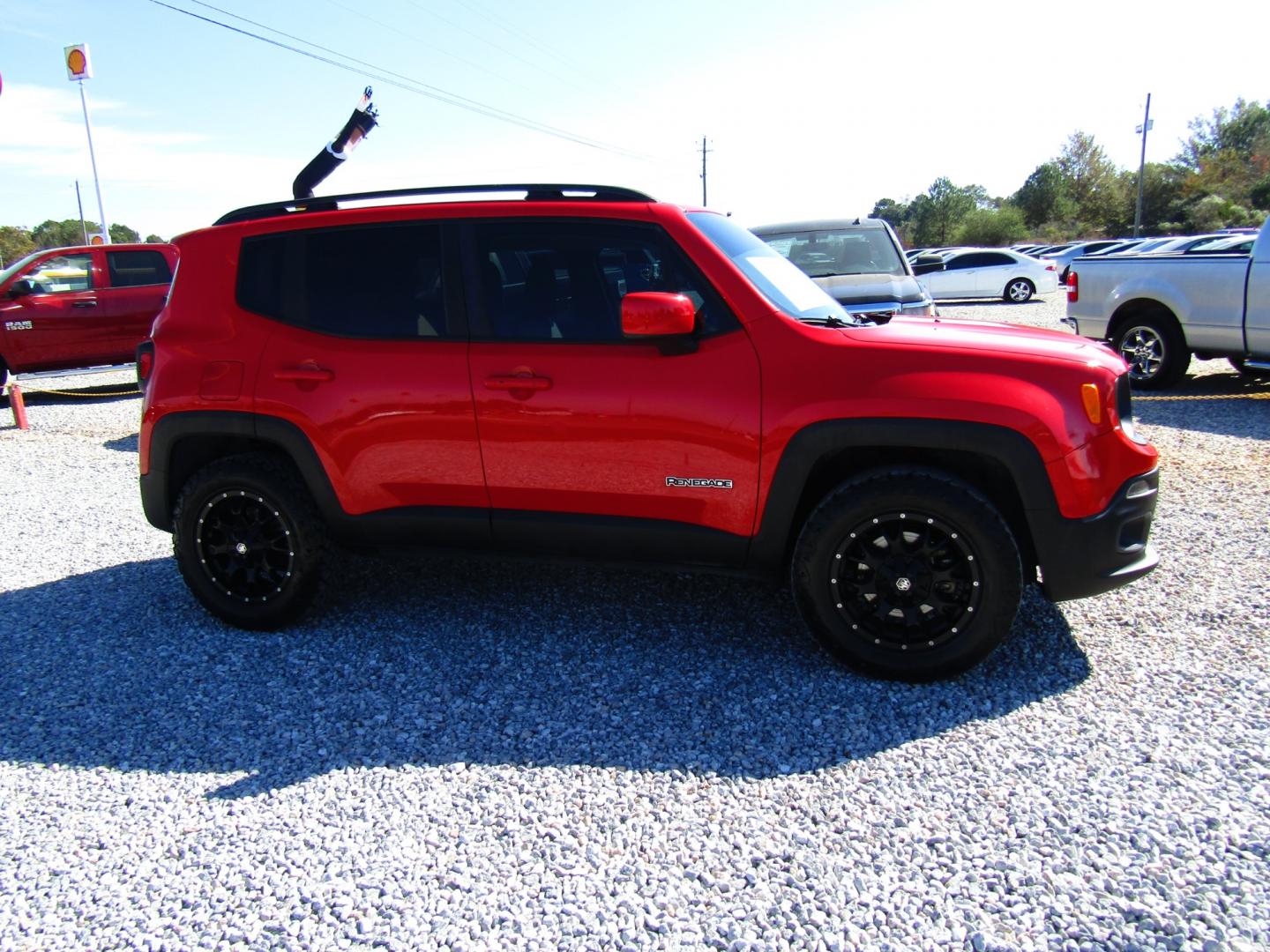 2016 Red Jeep Renegade Latitude FWD (ZACCJABT9GP) with an 2.4L L4 DOHC 16V engine, Automatic transmission, located at 15016 S Hwy 231, Midland City, AL, 36350, (334) 983-3001, 31.306210, -85.495277 - Photo#0