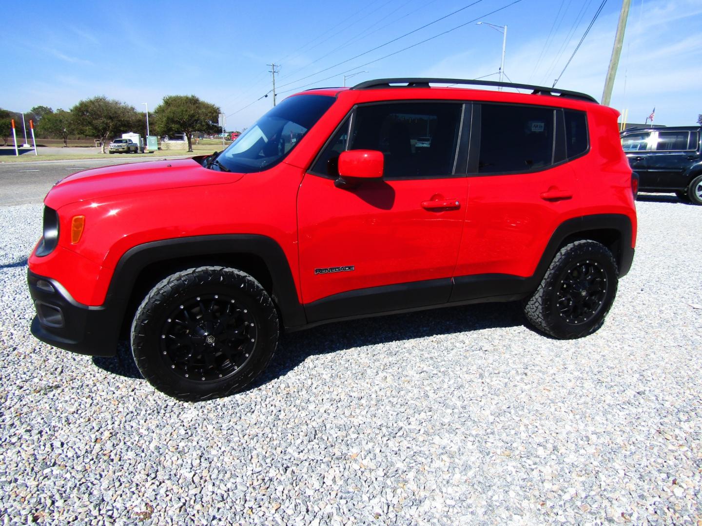 2016 Red Jeep Renegade Latitude FWD (ZACCJABT9GP) with an 2.4L L4 DOHC 16V engine, Automatic transmission, located at 15016 S Hwy 231, Midland City, AL, 36350, (334) 983-3001, 31.306210, -85.495277 - Photo#2