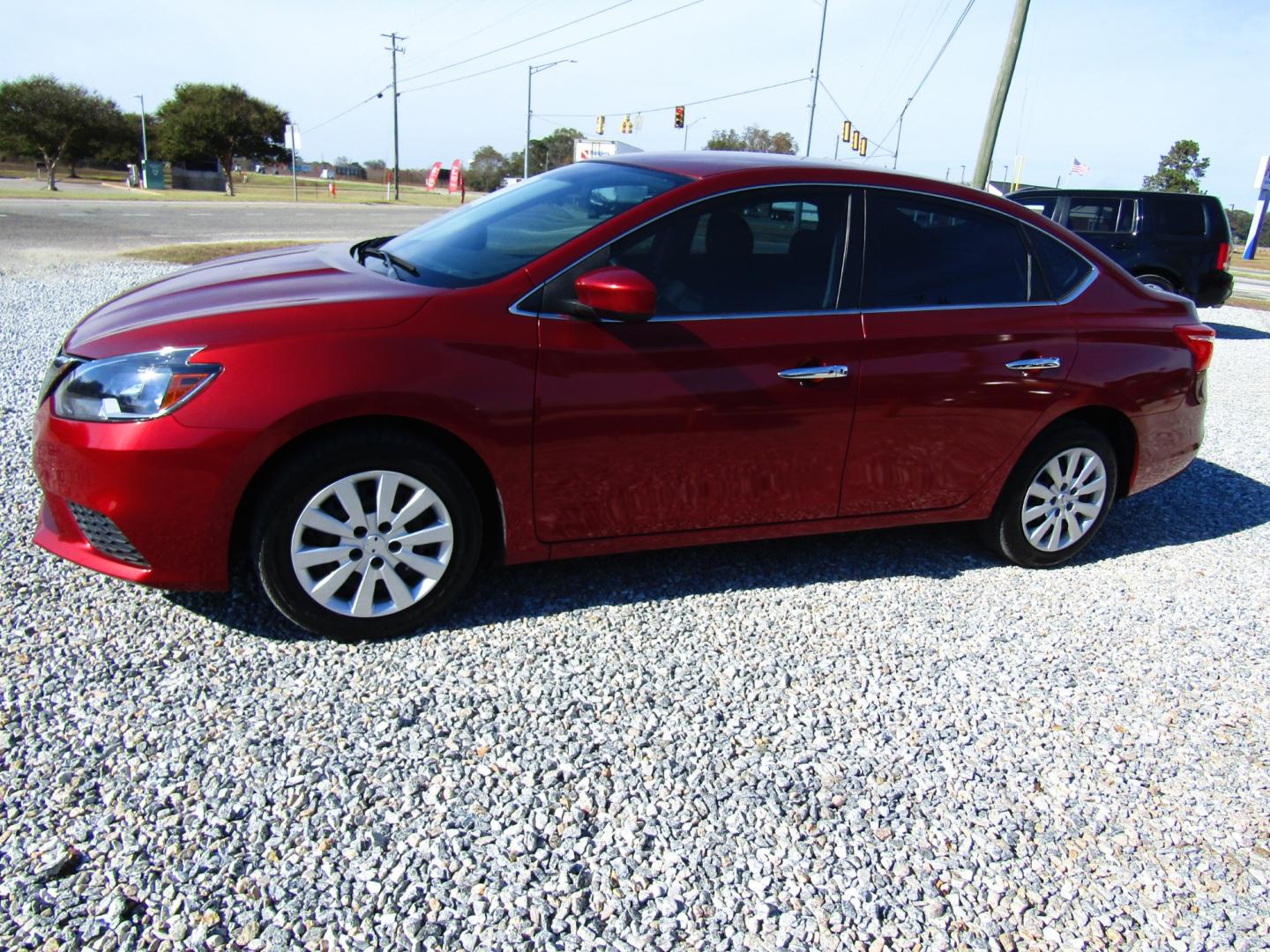 2017 Red /Black Nissan Sentra S 6MT (3N1AB7AP1HY) with an 1.8L L4 SFI DOHC 16V engine, Automatic transmission, located at 15016 S Hwy 231, Midland City, AL, 36350, (334) 983-3001, 31.306210, -85.495277 - Photo#2