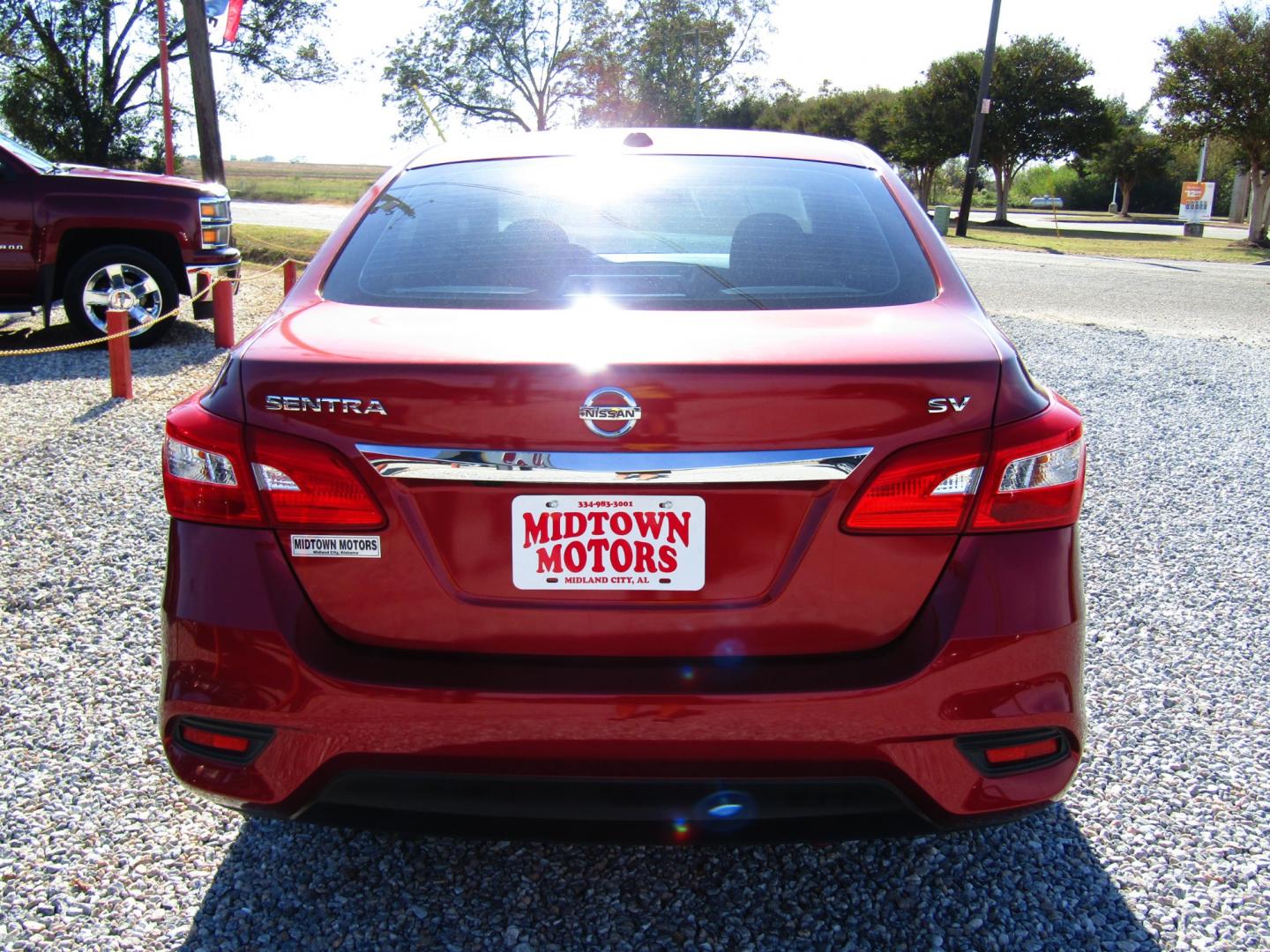 2017 Red /Black Nissan Sentra S 6MT (3N1AB7AP1HY) with an 1.8L L4 SFI DOHC 16V engine, Automatic transmission, located at 15016 S Hwy 231, Midland City, AL, 36350, (334) 983-3001, 31.306210, -85.495277 - Photo#6