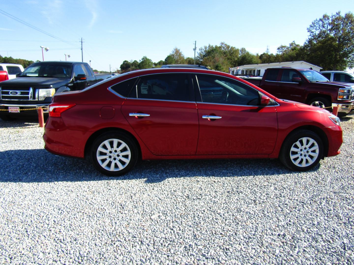 2017 Red /Black Nissan Sentra S 6MT (3N1AB7AP1HY) with an 1.8L L4 SFI DOHC 16V engine, Automatic transmission, located at 15016 S Hwy 231, Midland City, AL, 36350, (334) 983-3001, 31.306210, -85.495277 - Photo#7