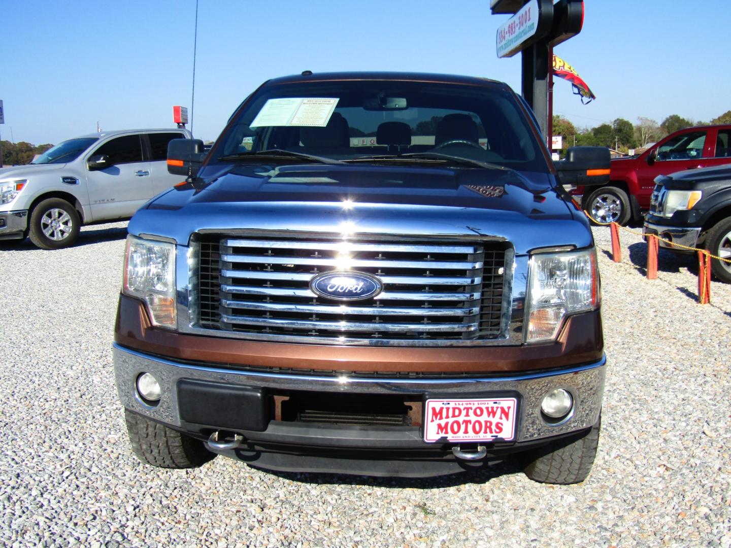 2012 Brown /Tan Ford F-150 FX4 SuperCab 6.5-ft. Bed 4WD (1FTFX1ET3CF) with an 3.5L V6 TURBO engine, Automatic transmission, located at 15016 S Hwy 231, Midland City, AL, 36350, (334) 983-3001, 31.306210, -85.495277 - Photo#1