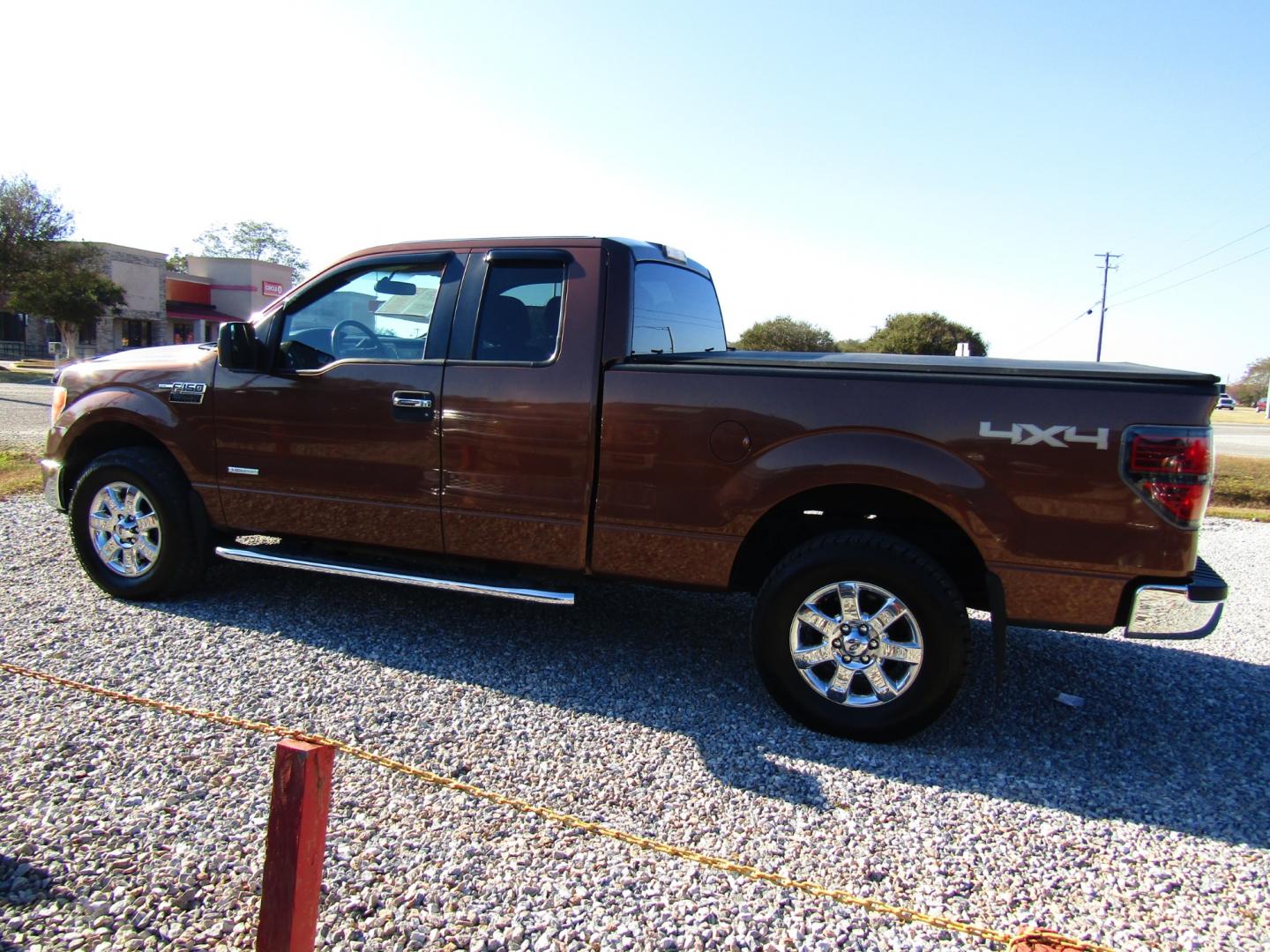 2012 Brown /Tan Ford F-150 FX4 SuperCab 6.5-ft. Bed 4WD (1FTFX1ET3CF) with an 3.5L V6 TURBO engine, Automatic transmission, located at 15016 S Hwy 231, Midland City, AL, 36350, (334) 983-3001, 31.306210, -85.495277 - Photo#5