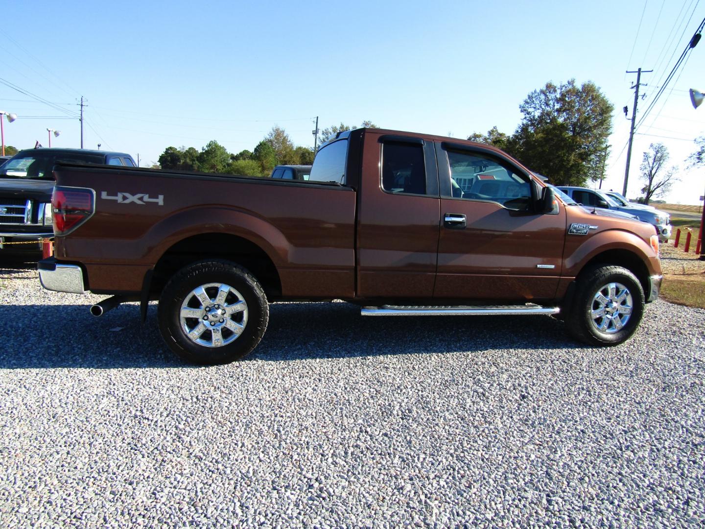 2012 Brown /Tan Ford F-150 FX4 SuperCab 6.5-ft. Bed 4WD (1FTFX1ET3CF) with an 3.5L V6 TURBO engine, Automatic transmission, located at 15016 S Hwy 231, Midland City, AL, 36350, (334) 983-3001, 31.306210, -85.495277 - Photo#7