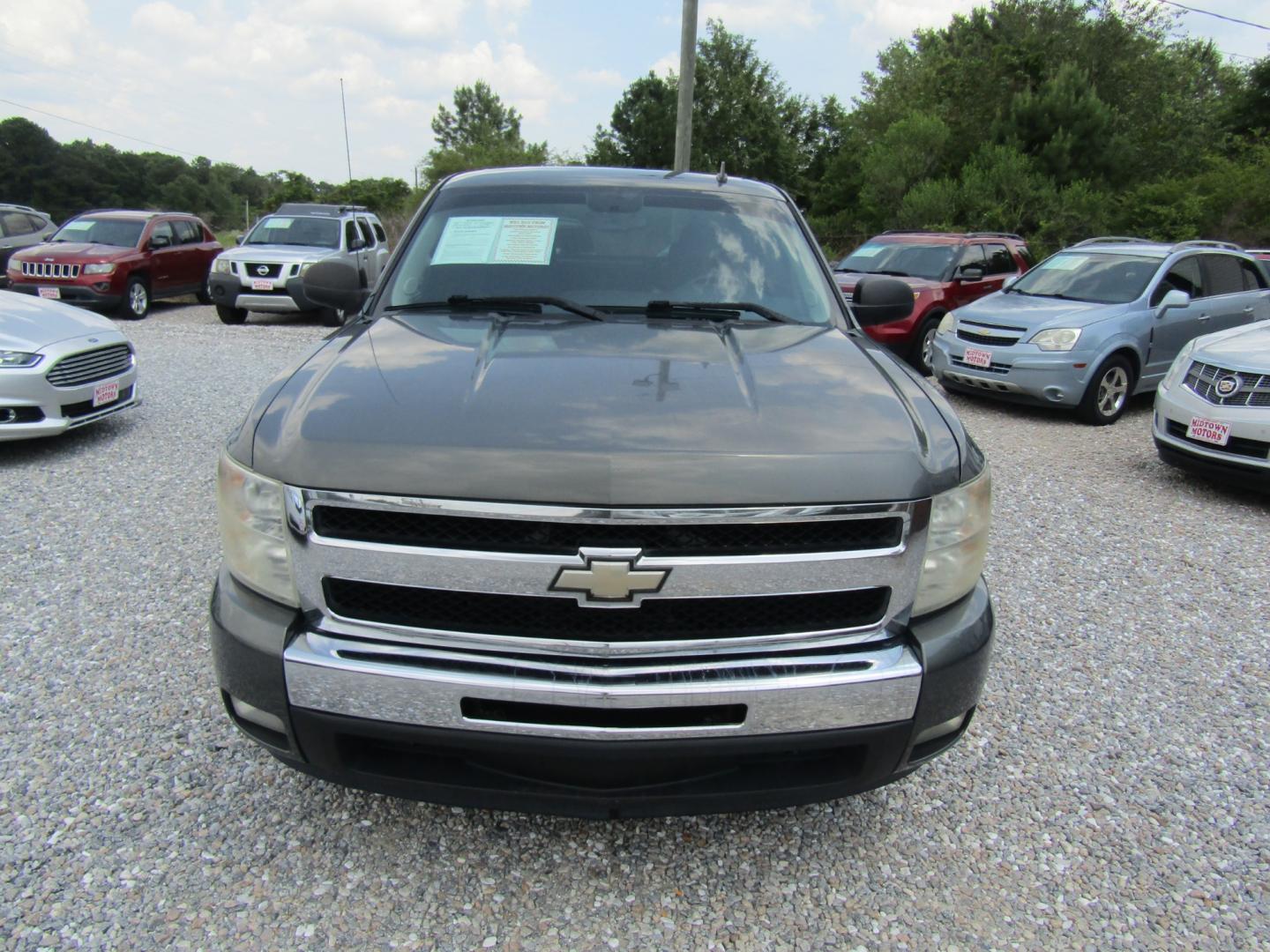 2011 Gray /Gray Chevrolet Silverado 1500 LT Ext. Cab 2WD (1GCRCSE06BZ) with an 5.3L V8 OHV 16V FFV engine, Automatic transmission, located at 15016 S Hwy 231, Midland City, AL, 36350, (334) 983-3001, 31.306210, -85.495277 - Photo#1