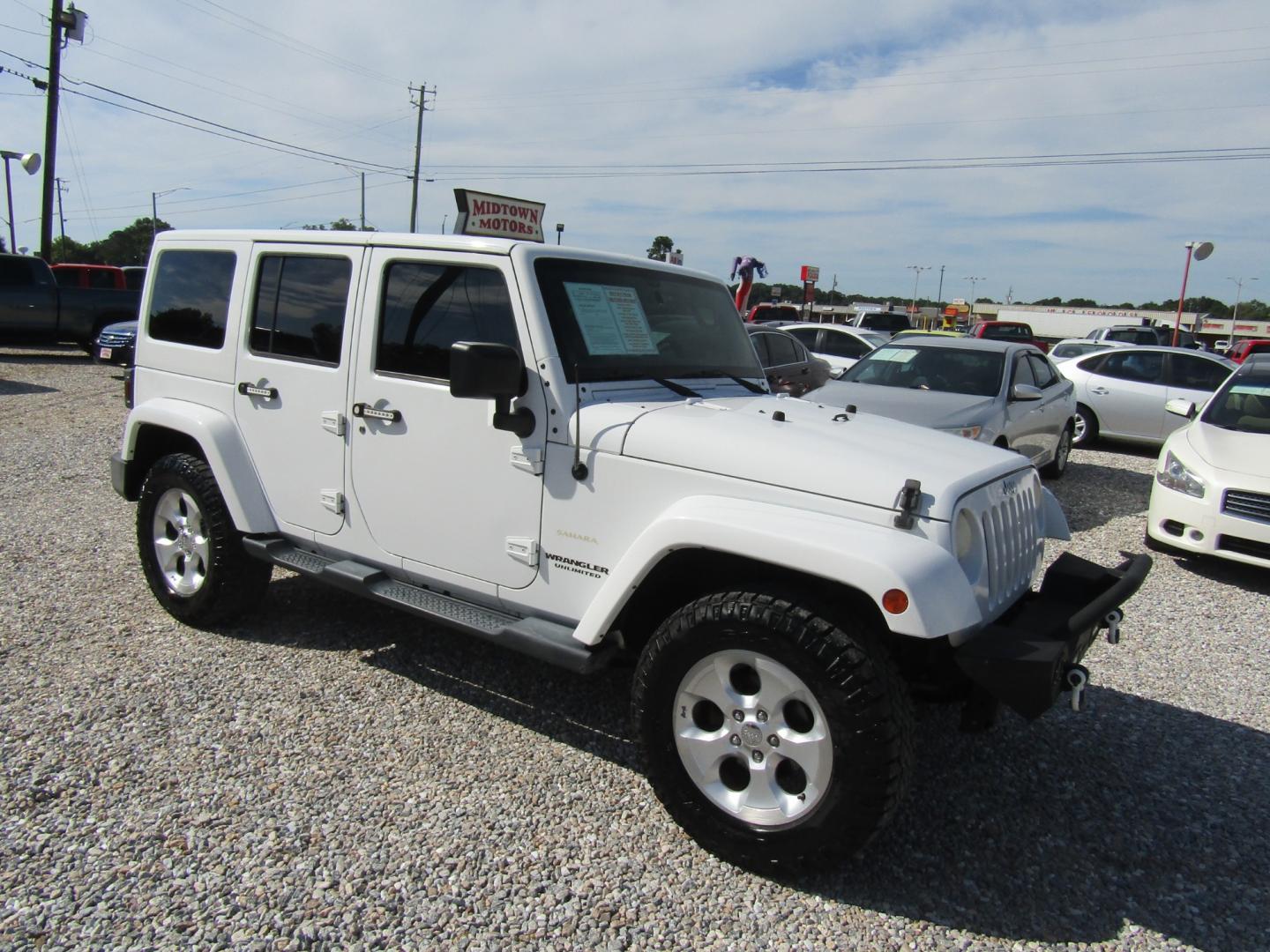 2014 White Jeep Wrangler (1C4BJWEG0EL) with an V6 engine, Automatic transmission, located at 15016 S Hwy 231, Midland City, AL, 36350, (334) 983-3001, 31.306210, -85.495277 - Photo#0