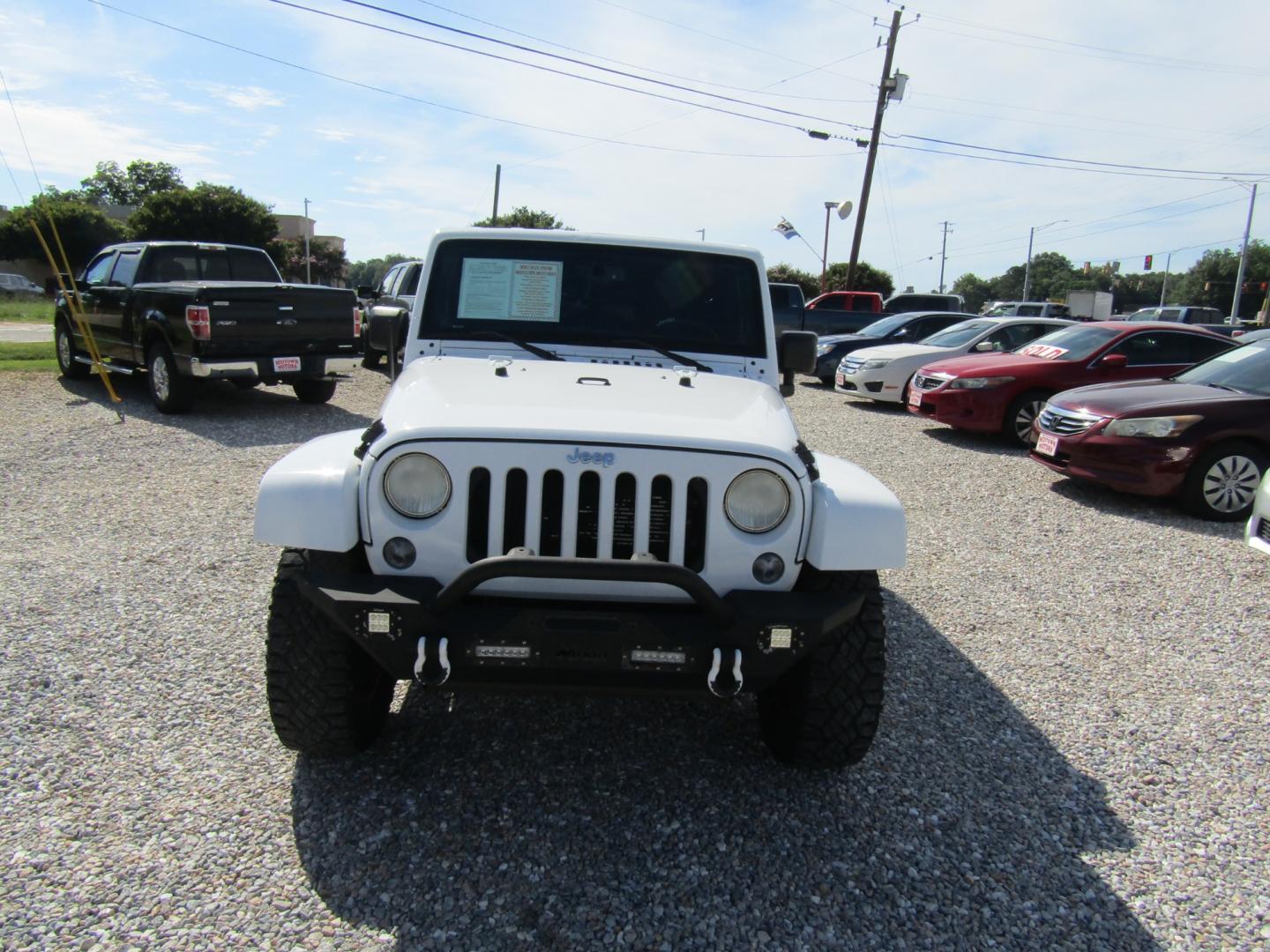 2014 White Jeep Wrangler (1C4BJWEG0EL) with an V6 engine, Automatic transmission, located at 15016 S Hwy 231, Midland City, AL, 36350, (334) 983-3001, 31.306210, -85.495277 - Photo#1