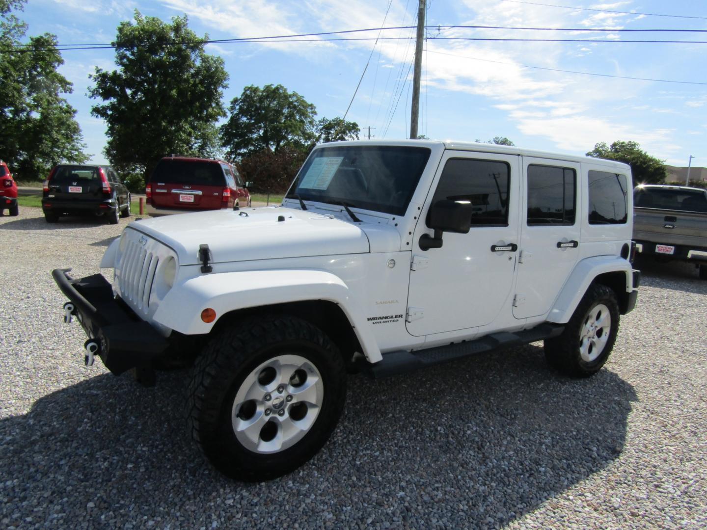 2014 White Jeep Wrangler (1C4BJWEG0EL) with an V6 engine, Automatic transmission, located at 15016 S Hwy 231, Midland City, AL, 36350, (334) 983-3001, 31.306210, -85.495277 - Photo#2