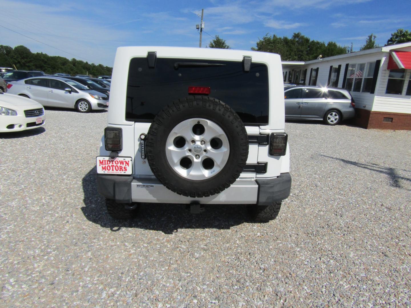 2014 White Jeep Wrangler (1C4BJWEG0EL) with an V6 engine, Automatic transmission, located at 15016 S Hwy 231, Midland City, AL, 36350, (334) 983-3001, 31.306210, -85.495277 - Photo#6