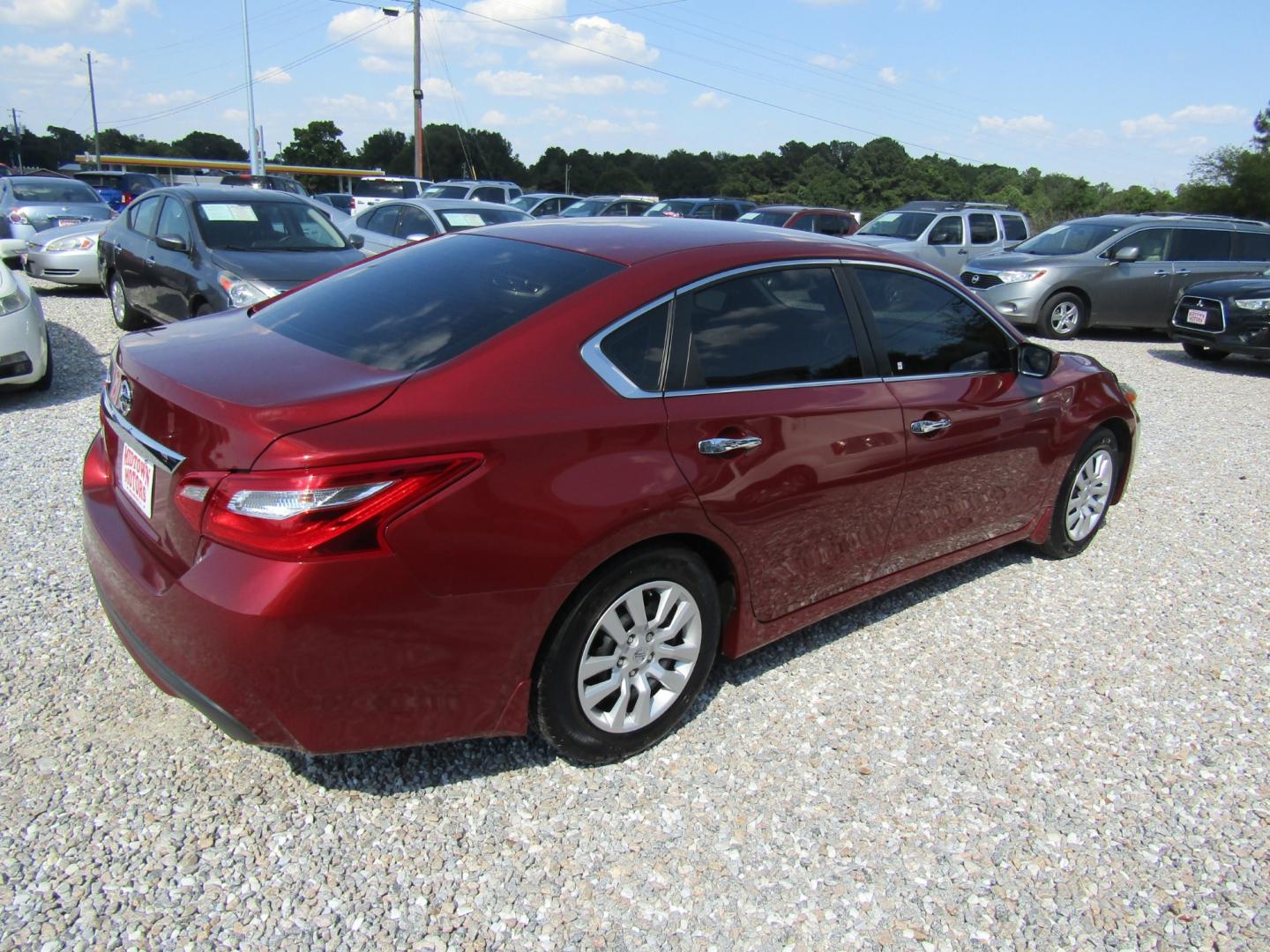 2016 Red /Gray Nissan Altima 2.5 SL (1N4AL3AP3GN) with an 2.5L L4 DOHC 16V engine, Automatic transmission, located at 15016 S Hwy 231, Midland City, AL, 36350, (334) 983-3001, 31.306210, -85.495277 - Photo#7