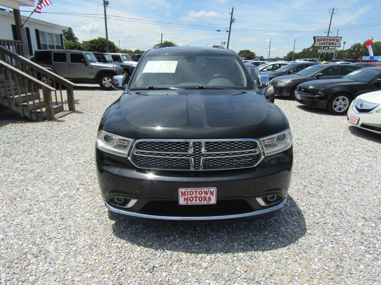 2015 Black Dodge Durango Citadel 2WD (1C4RDHEG3FC) with an 3.6L V6 DOHC 24V engine, Automatic transmission, located at 15016 S Hwy 231, Midland City, AL, 36350, (334) 983-3001, 31.306210, -85.495277 - Photo#1