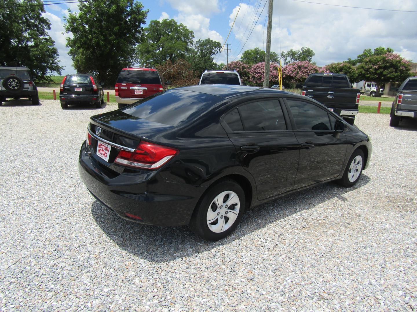 2013 Black Honda Civic LX Sedan 5-Speed AT (19XFB2F58DE) with an 1.8L L4 SOHC 16V engine, Automatic transmission, located at 15016 S Hwy 231, Midland City, AL, 36350, (334) 983-3001, 31.306210, -85.495277 - Photo#7