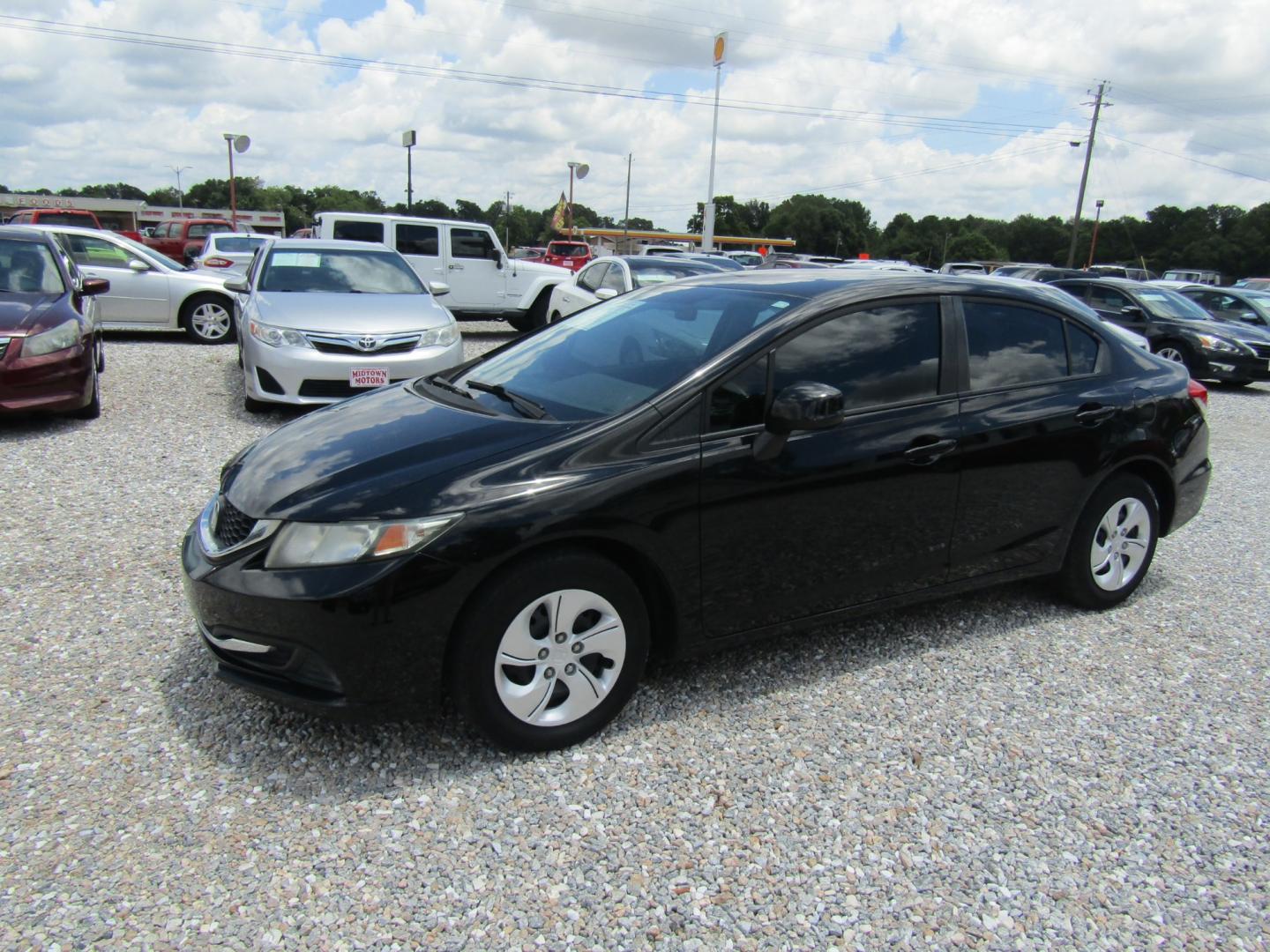 2013 Black Honda Civic LX Sedan 5-Speed AT (19XFB2F58DE) with an 1.8L L4 SOHC 16V engine, Automatic transmission, located at 15016 S Hwy 231, Midland City, AL, 36350, (334) 983-3001, 31.306210, -85.495277 - Photo#2