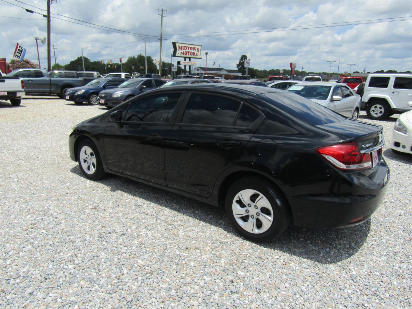 2013 Black Honda Civic LX Sedan 5-Speed AT (19XFB2F58DE) with an 1.8L L4 SOHC 16V engine, Automatic transmission, located at 15016 S Hwy 231, Midland City, AL, 36350, (334) 983-3001, 31.306210, -85.495277 - Photo#5