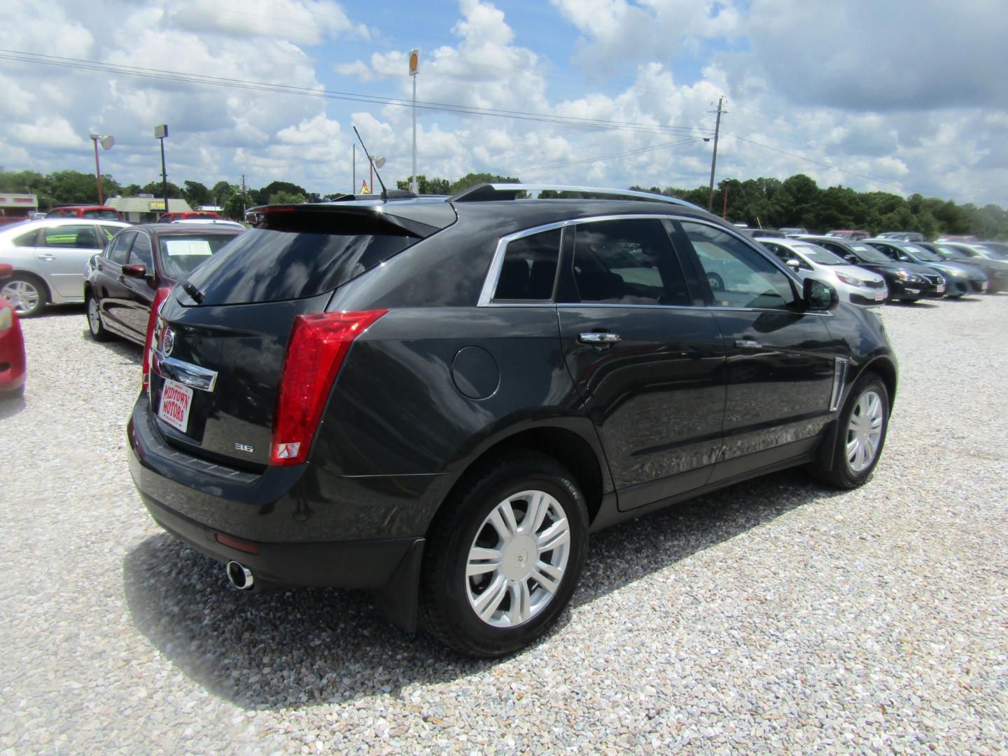 2015 Gray /Gray Cadillac SRX Luxury Collection FWD (3GYFNBE34FS) with an 3.6L V6 DOHC 24V FFV engine, Automatic transmission, located at 15016 S Hwy 231, Midland City, AL, 36350, (334) 983-3001, 31.306210, -85.495277 - Photo#7