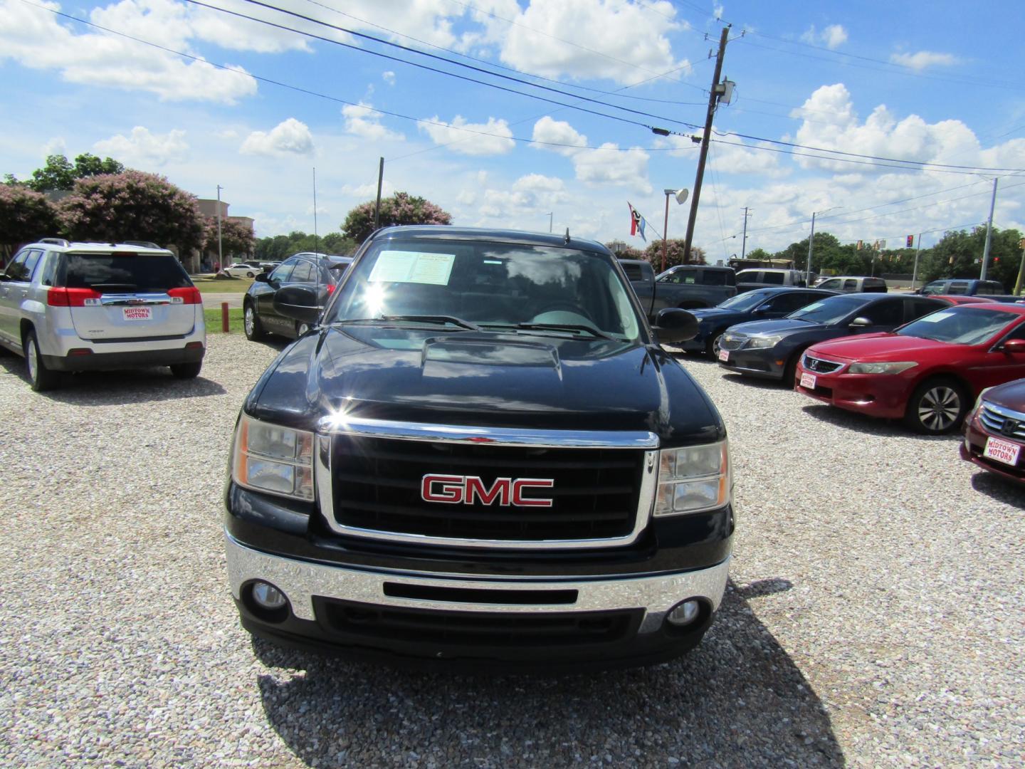 2011 Black GMC Sierra 1500 SLT Ext. Cab 4WD (1GTR2WE32BZ) with an 5.3L V8 OHV 16V FFV engine, Automatic transmission, located at 15016 S Hwy 231, Midland City, AL, 36350, (334) 983-3001, 31.306210, -85.495277 - Photo#1