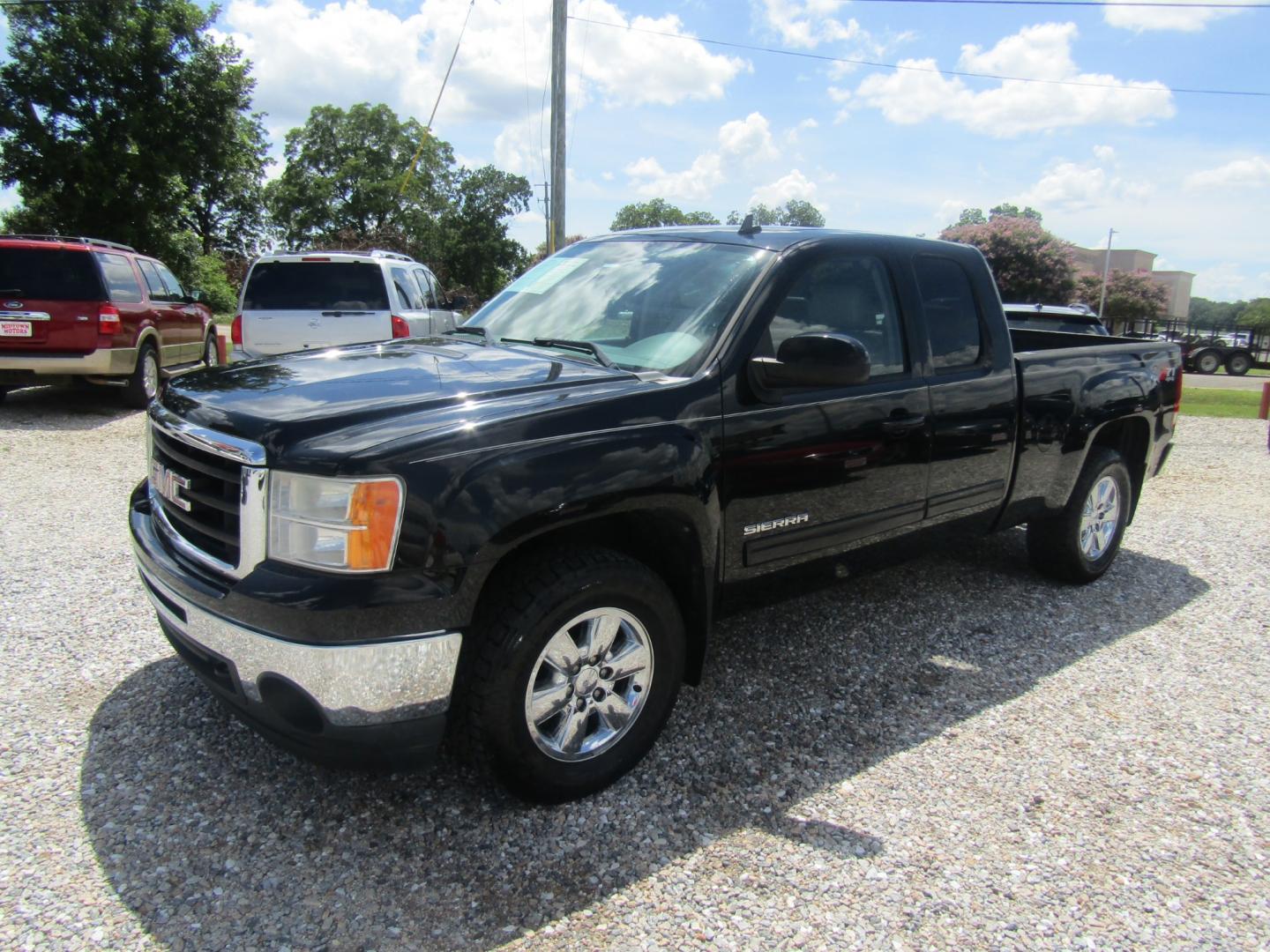 2011 Black GMC Sierra 1500 SLT Ext. Cab 4WD (1GTR2WE32BZ) with an 5.3L V8 OHV 16V FFV engine, Automatic transmission, located at 15016 S Hwy 231, Midland City, AL, 36350, (334) 983-3001, 31.306210, -85.495277 - Photo#2