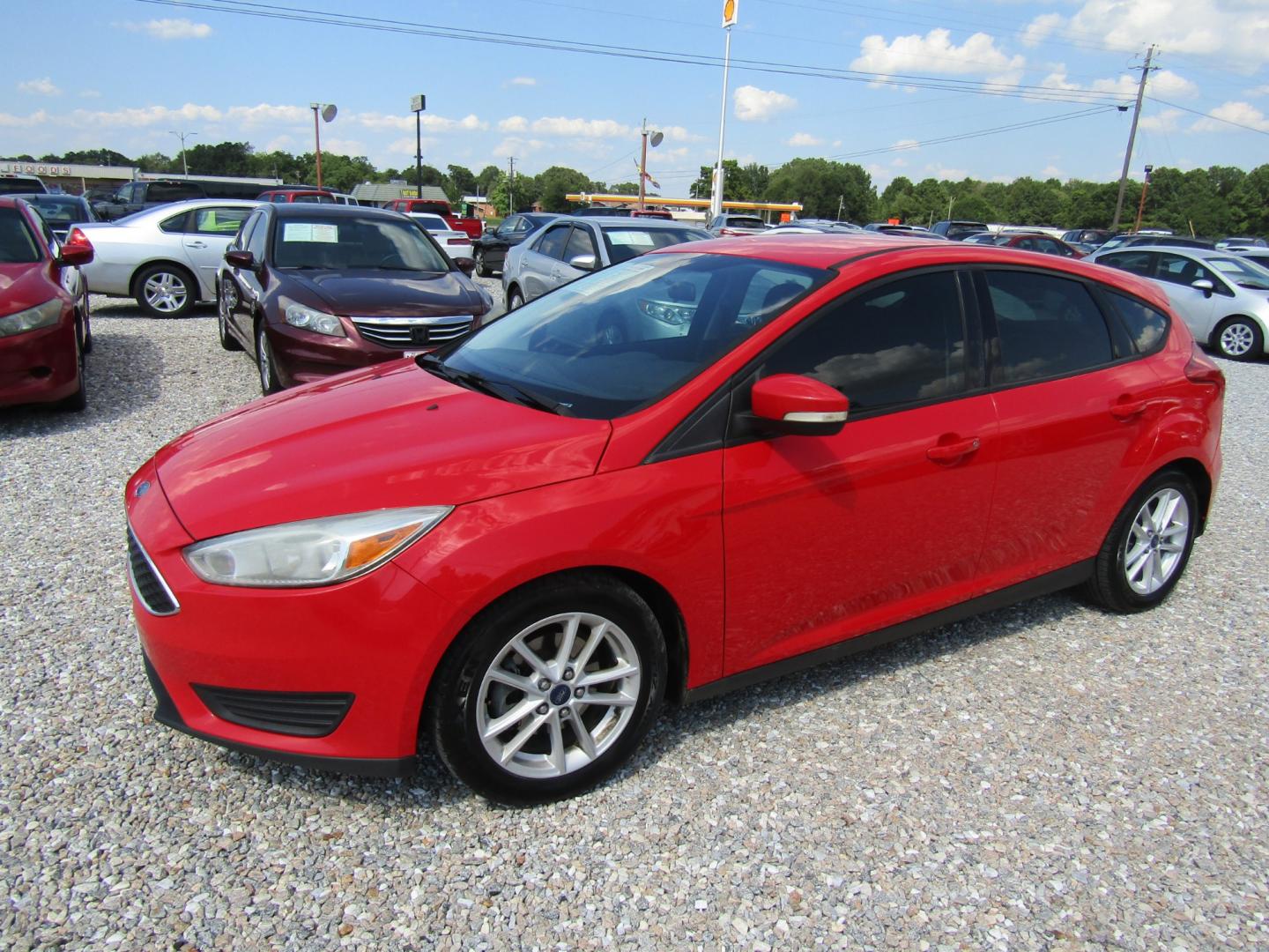 2015 Red /Gray Ford Focus SE Hatch (1FADP3K29FL) with an 2.0L L4 DOHC 16V engine, Automatic transmission, located at 15016 S Hwy 231, Midland City, AL, 36350, (334) 983-3001, 31.306210, -85.495277 - Photo#2