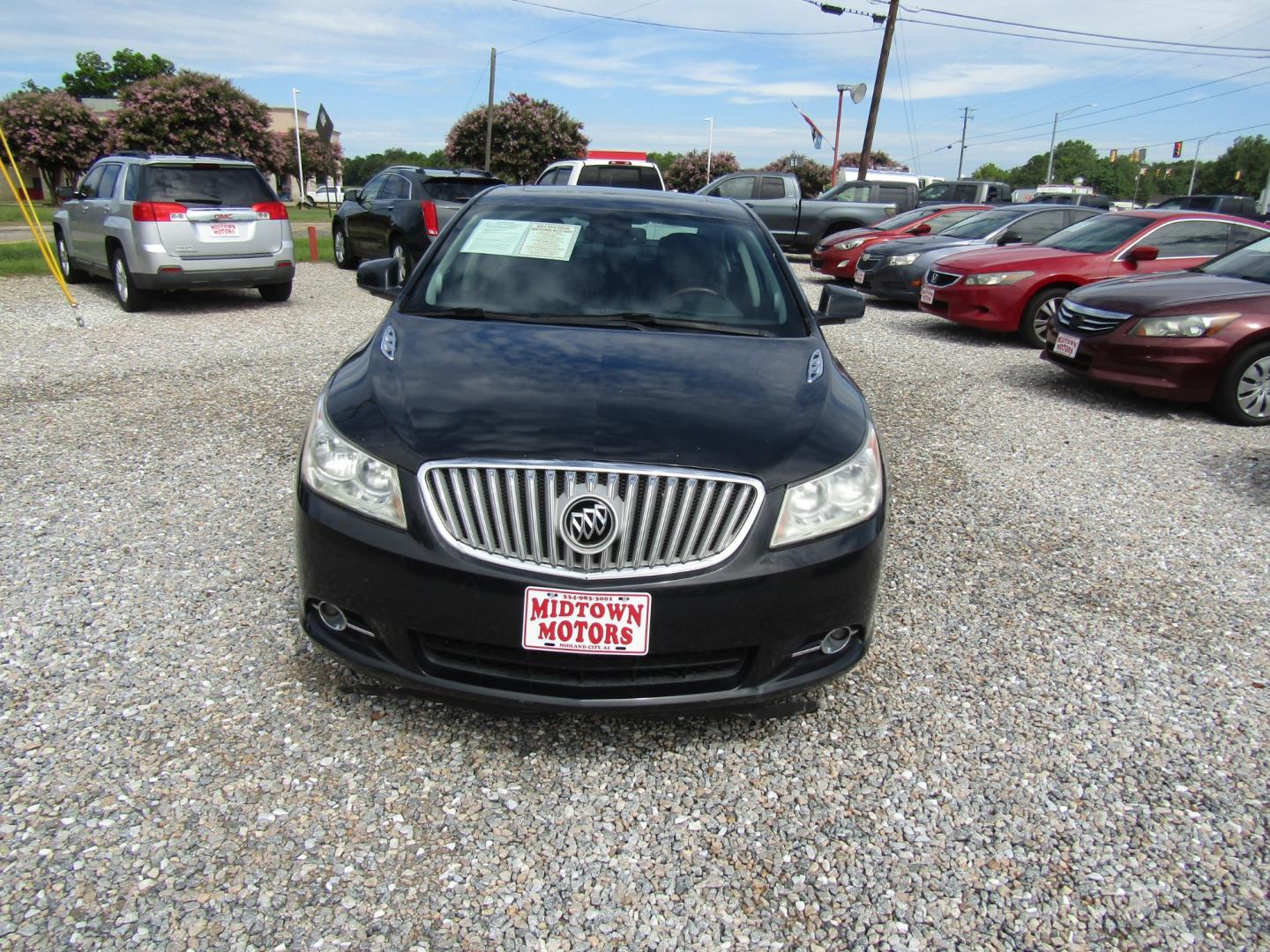 2012 Black Buick LaCrosse Premium Package 3, w/Leather (1G4GH5G37CF) with an 3.6L V6 DOHC 24V FFV engine, Automatic transmission, located at 15016 S Hwy 231, Midland City, AL, 36350, (334) 983-3001, 31.306210, -85.495277 - Photo#1