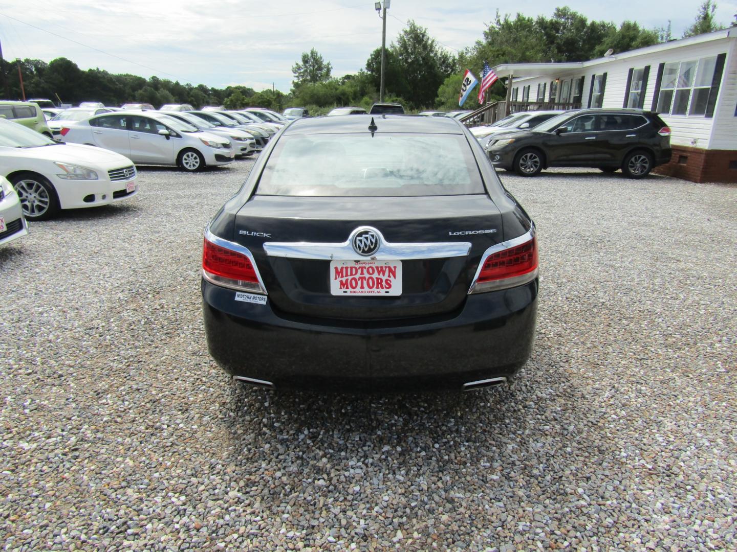 2012 Black Buick LaCrosse Premium Package 3, w/Leather (1G4GH5G37CF) with an 3.6L V6 DOHC 24V FFV engine, Automatic transmission, located at 15016 S Hwy 231, Midland City, AL, 36350, (334) 983-3001, 31.306210, -85.495277 - Photo#6