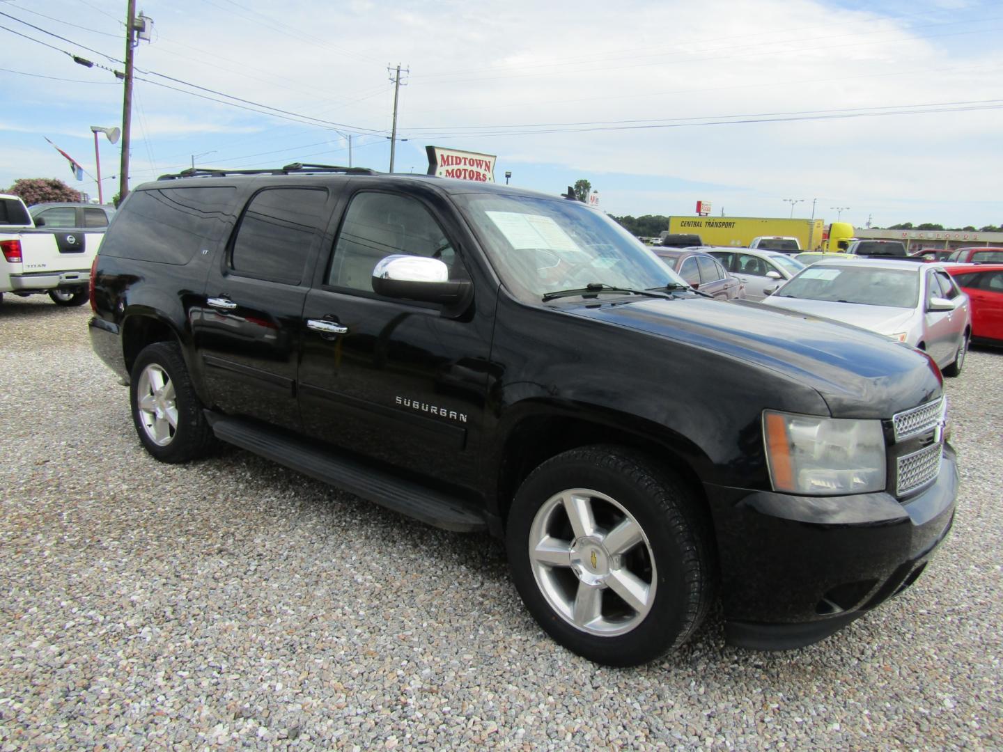 2011 Black /Tan Chevrolet Suburban LT 1500 2WD (1GNSCJE07BR) with an 5.3L V8 OHV 16V FFV engine, Automatic transmission, located at 15016 S Hwy 231, Midland City, AL, 36350, (334) 983-3001, 31.306210, -85.495277 - Photo#0