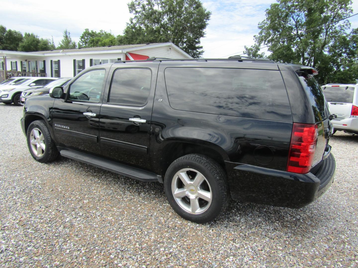 2011 Black /Tan Chevrolet Suburban LT 1500 2WD (1GNSCJE07BR) with an 5.3L V8 OHV 16V FFV engine, Automatic transmission, located at 15016 S Hwy 231, Midland City, AL, 36350, (334) 983-3001, 31.306210, -85.495277 - Photo#5