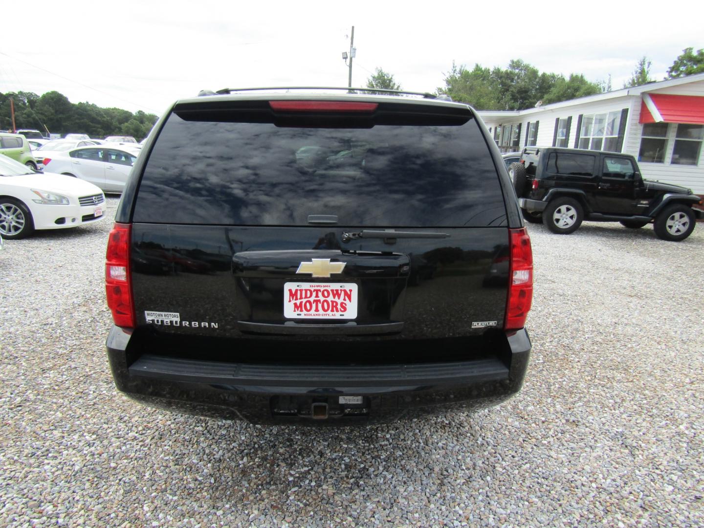 2011 Black /Tan Chevrolet Suburban LT 1500 2WD (1GNSCJE07BR) with an 5.3L V8 OHV 16V FFV engine, Automatic transmission, located at 15016 S Hwy 231, Midland City, AL, 36350, (334) 983-3001, 31.306210, -85.495277 - Photo#6