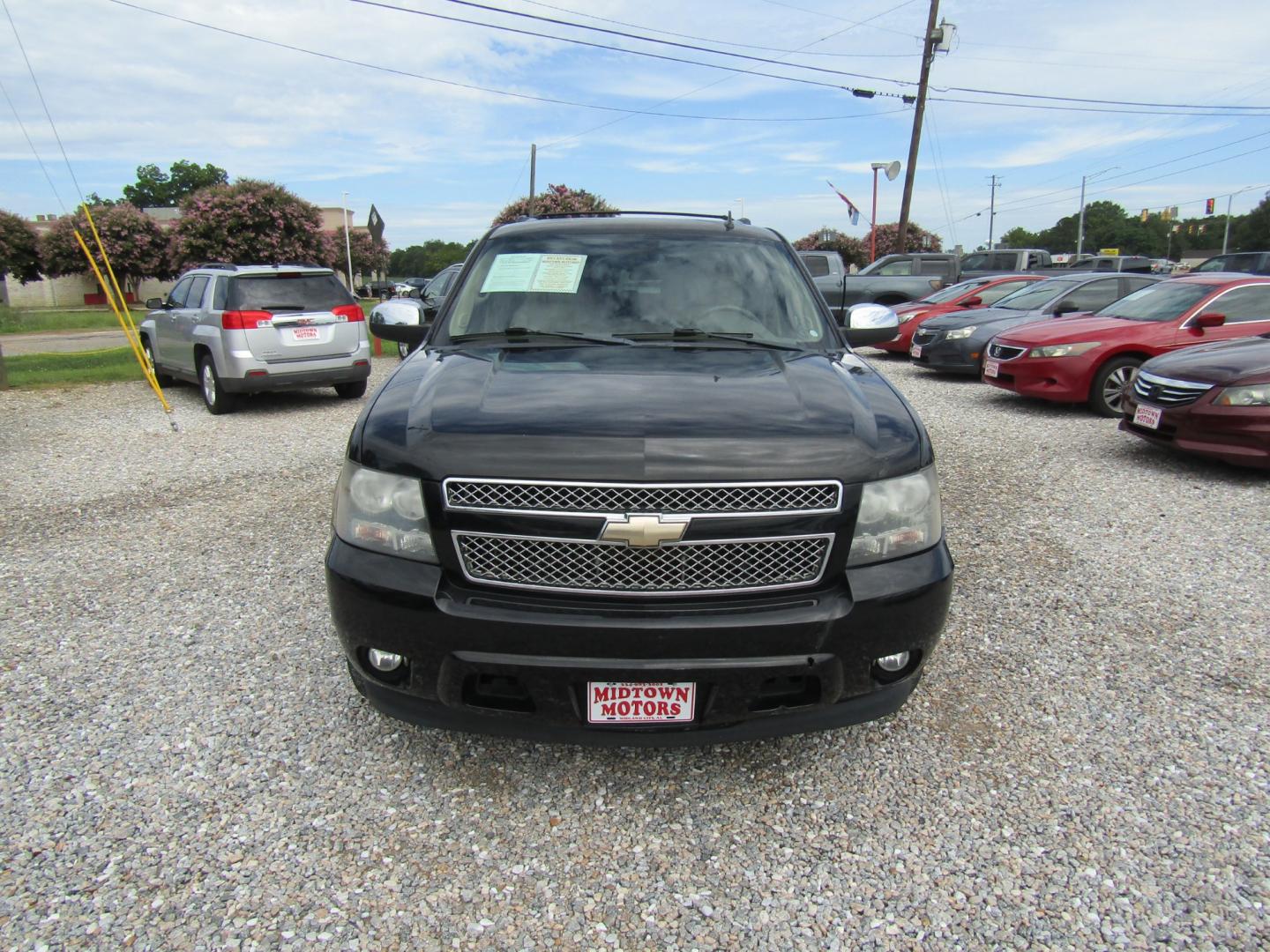 2011 Black /Tan Chevrolet Suburban LT 1500 2WD (1GNSCJE07BR) with an 5.3L V8 OHV 16V FFV engine, Automatic transmission, located at 15016 S Hwy 231, Midland City, AL, 36350, (334) 983-3001, 31.306210, -85.495277 - Photo#1