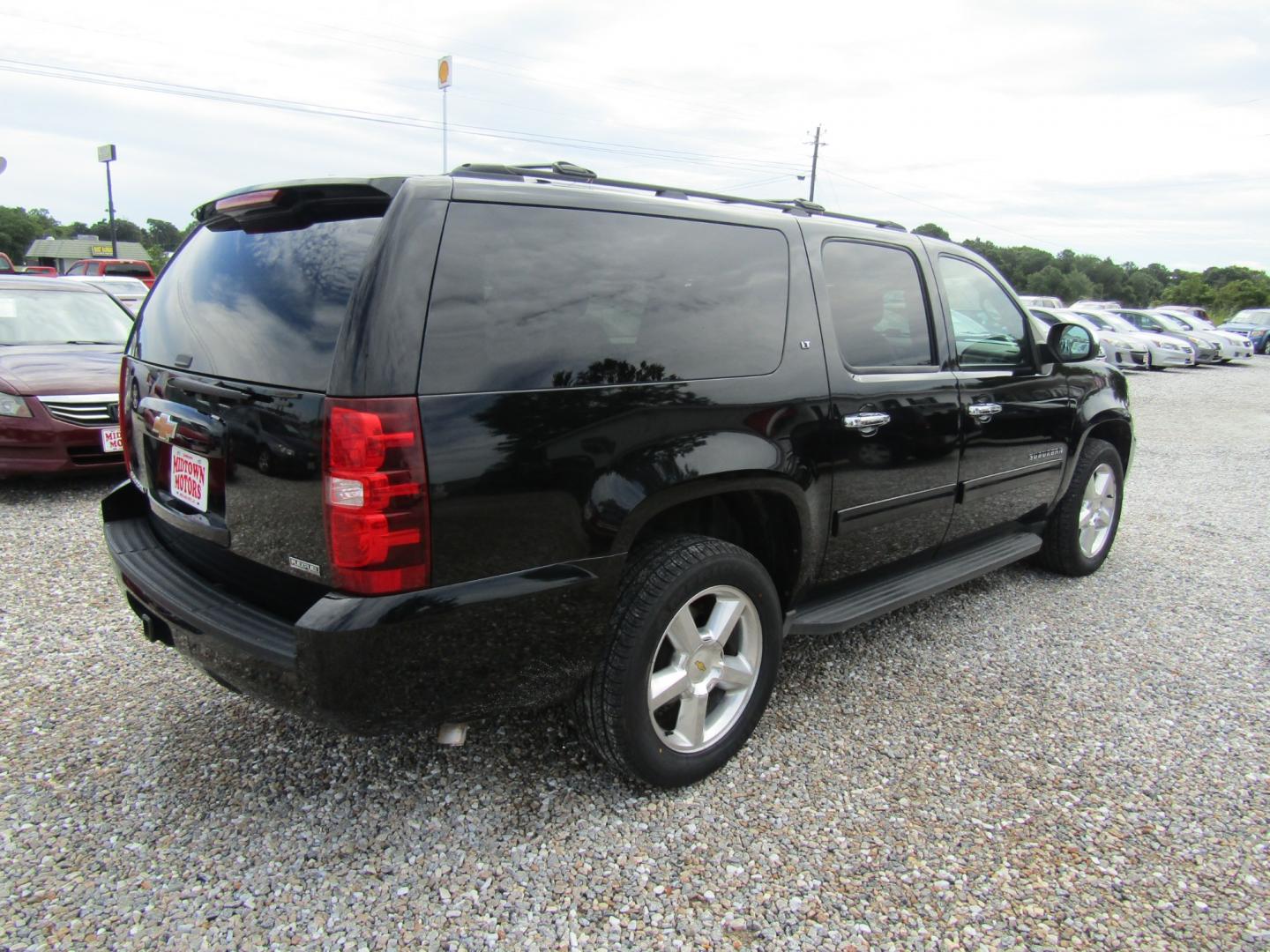 2011 Black /Tan Chevrolet Suburban LT 1500 2WD (1GNSCJE07BR) with an 5.3L V8 OHV 16V FFV engine, Automatic transmission, located at 15016 S Hwy 231, Midland City, AL, 36350, (334) 983-3001, 31.306210, -85.495277 - Photo#7