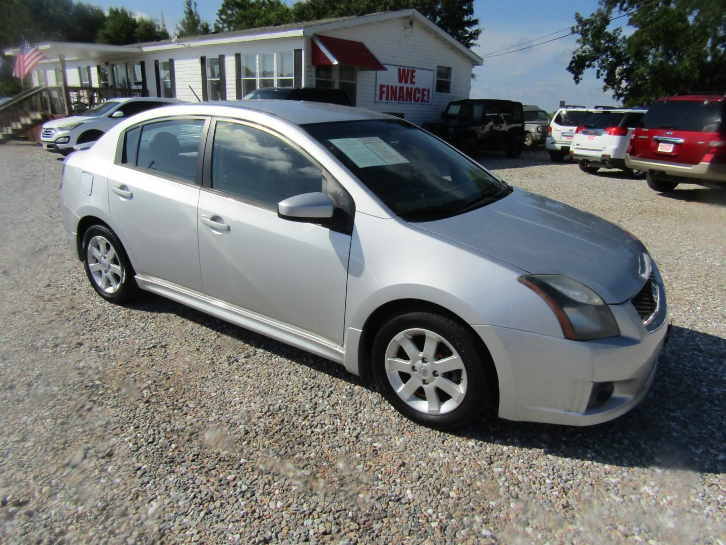 2012 Silver Nissan Sentra 2.0 (3N1AB6AP7CL) with an 2.0L L4 DOHC 16V engine, Automatic transmission, located at 15016 S Hwy 231, Midland City, AL, 36350, (334) 983-3001, 31.306210, -85.495277 - Photo#0