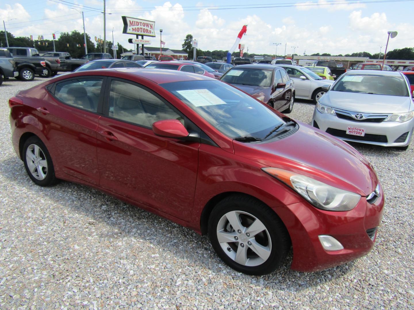 2012 Red /Tan Hyundai Elantra GLS A/T (KMHDH4AE4CU) with an 1.8L L4 DOHC 16V engine, Automatic transmission, located at 15016 S Hwy 231, Midland City, AL, 36350, (334) 983-3001, 31.306210, -85.495277 - Photo#0