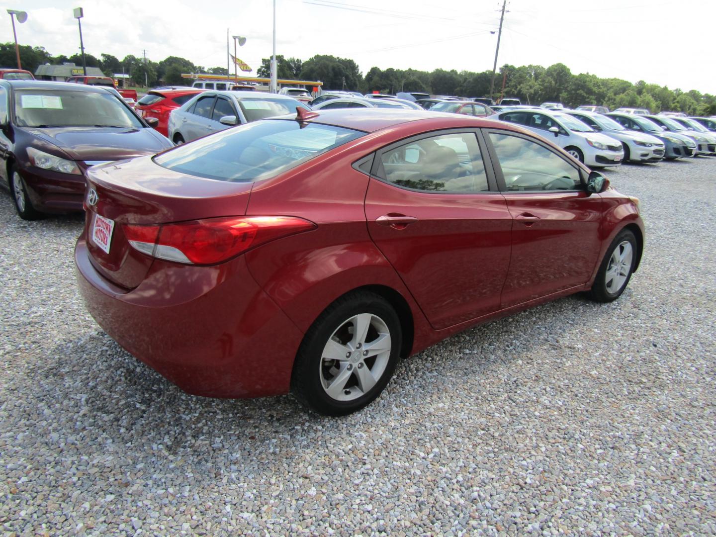 2012 Red /Tan Hyundai Elantra GLS A/T (KMHDH4AE4CU) with an 1.8L L4 DOHC 16V engine, Automatic transmission, located at 15016 S Hwy 231, Midland City, AL, 36350, (334) 983-3001, 31.306210, -85.495277 - Photo#7