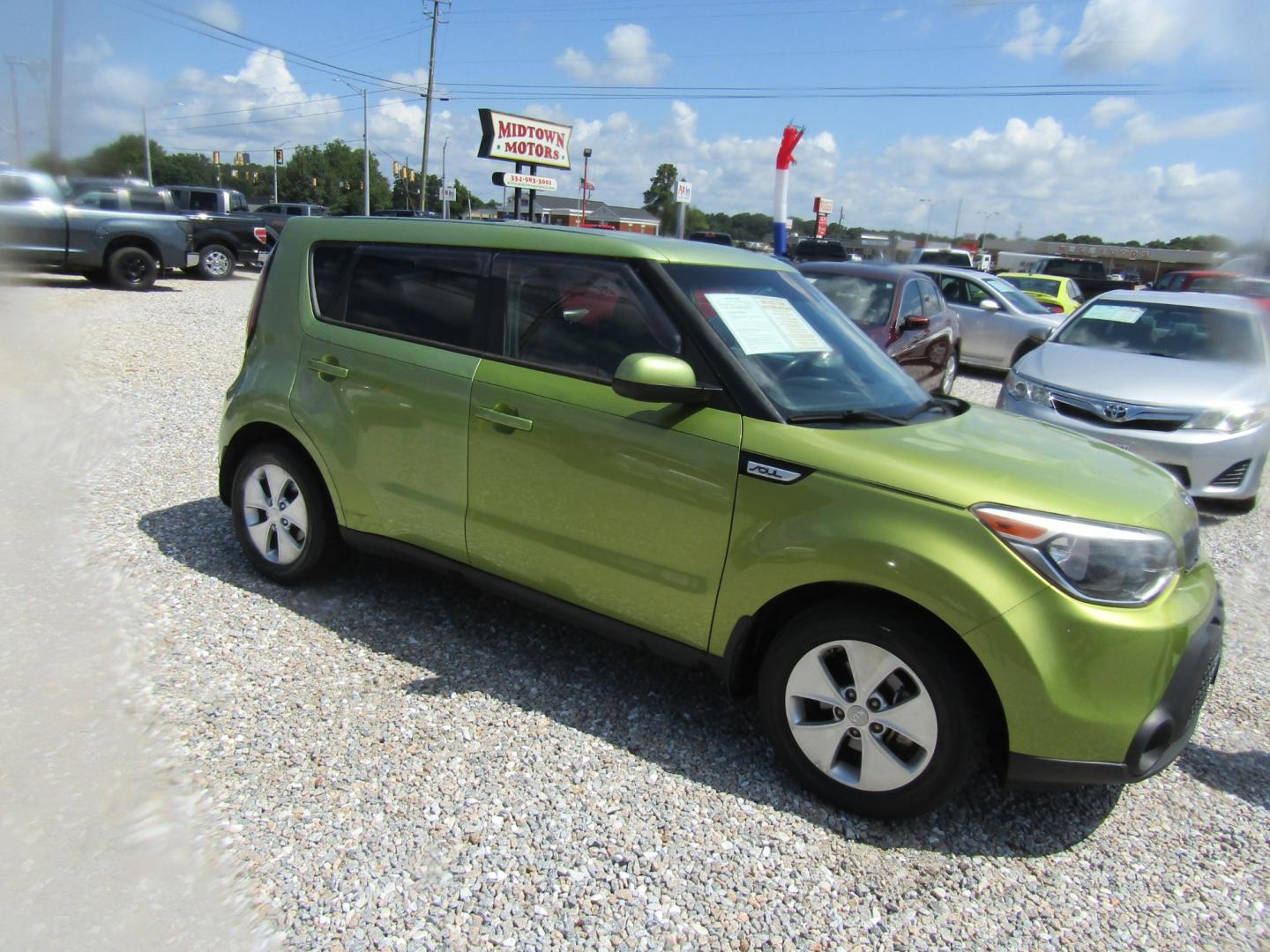 2015 Green /Tan Kia Soul Base (KNDJN2A21F7) with an 1.6L L4 DOHC 16V engine, Automatic transmission, located at 15016 S Hwy 231, Midland City, AL, 36350, (334) 983-3001, 31.306210, -85.495277 - Photo#0