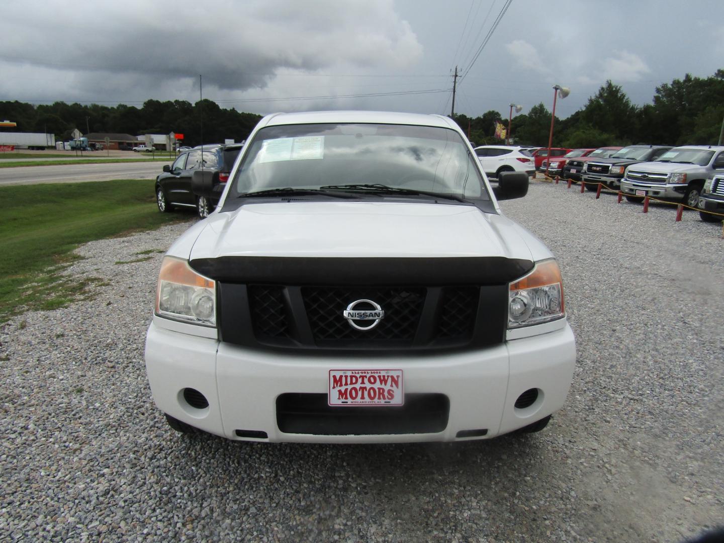 2011 White Nissan Titan SV Crew Cab 4WD (1N6BA0EK8BN) with an 5.6L V8 DOHC 32V FFV engine, Automatic transmission, located at 15016 S Hwy 231, Midland City, AL, 36350, (334) 983-3001, 31.306210, -85.495277 - Photo#1