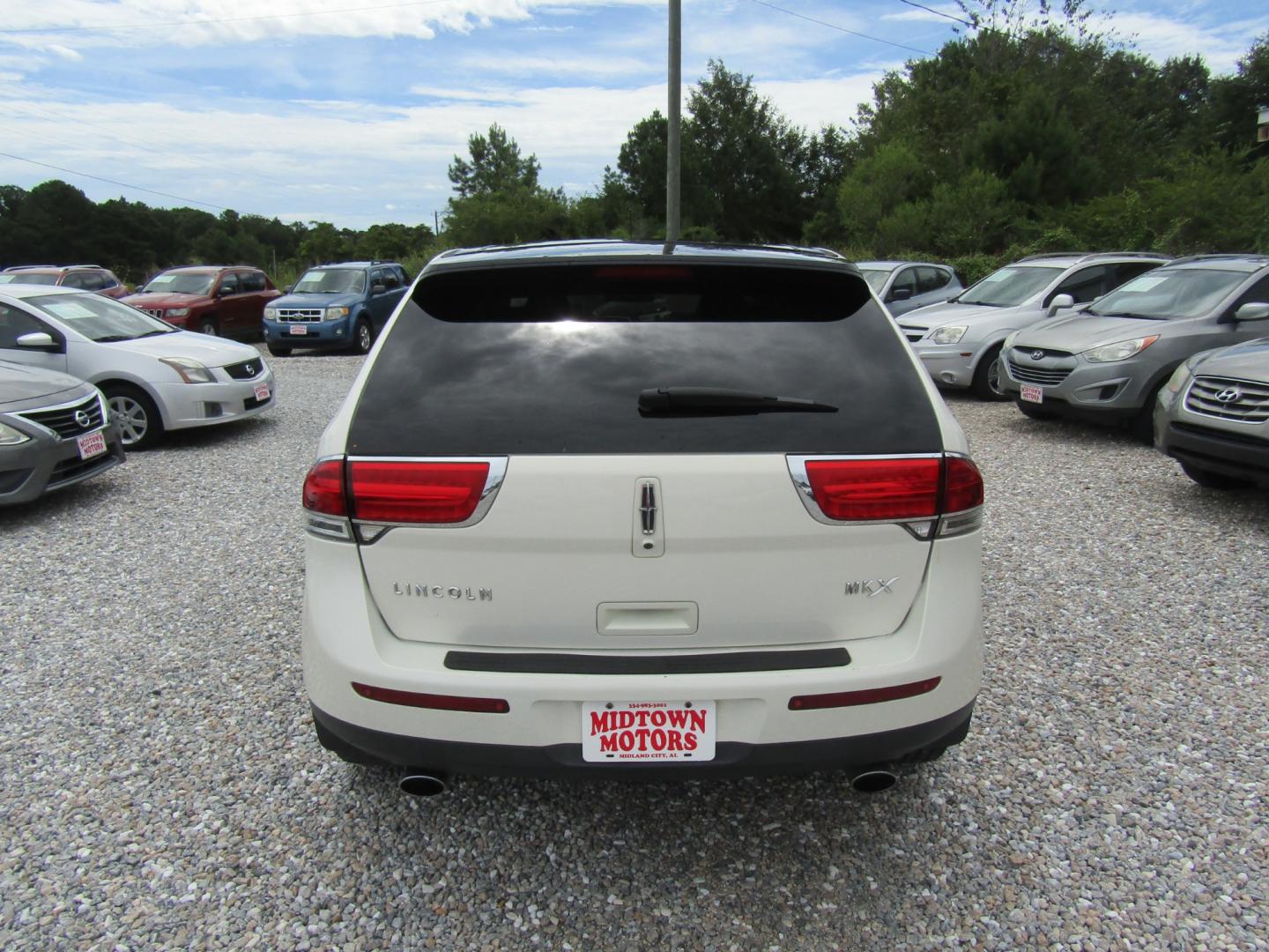 2013 CREAM /Tan Lincoln MKX FWD (2LMDJ6JK8DB) with an 3.7L V6 DOHC 24V engine, Automatic transmission, located at 15016 S Hwy 231, Midland City, AL, 36350, (334) 983-3001, 31.306210, -85.495277 - Photo#6