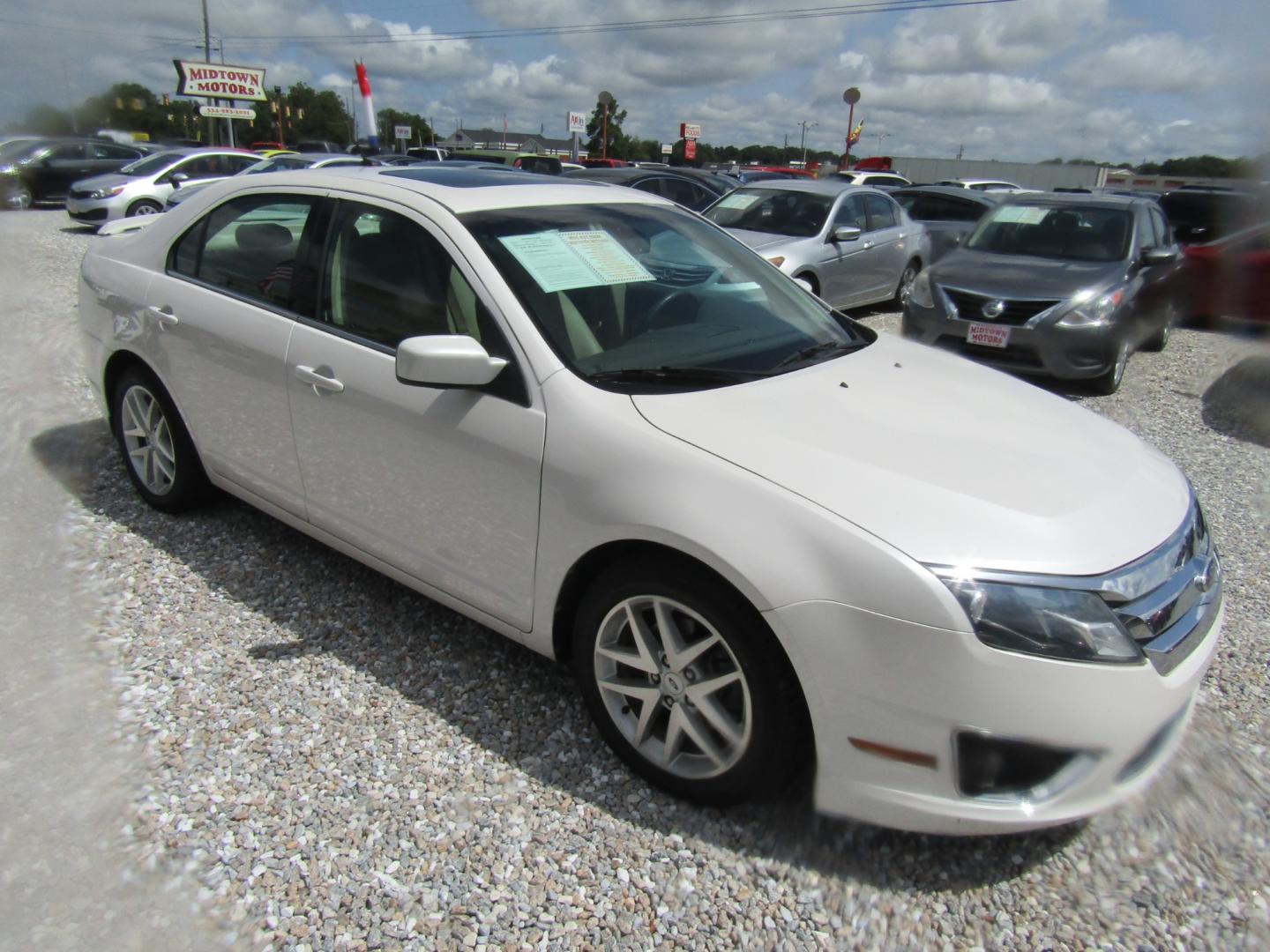 2012 White /Tan Ford Fusion SEL (3FAHP0JA4CR) with an 2.5L L4 DOHC 16V engine, Automatic transmission, located at 15016 S Hwy 231, Midland City, AL, 36350, (334) 983-3001, 31.306210, -85.495277 - Photo#0