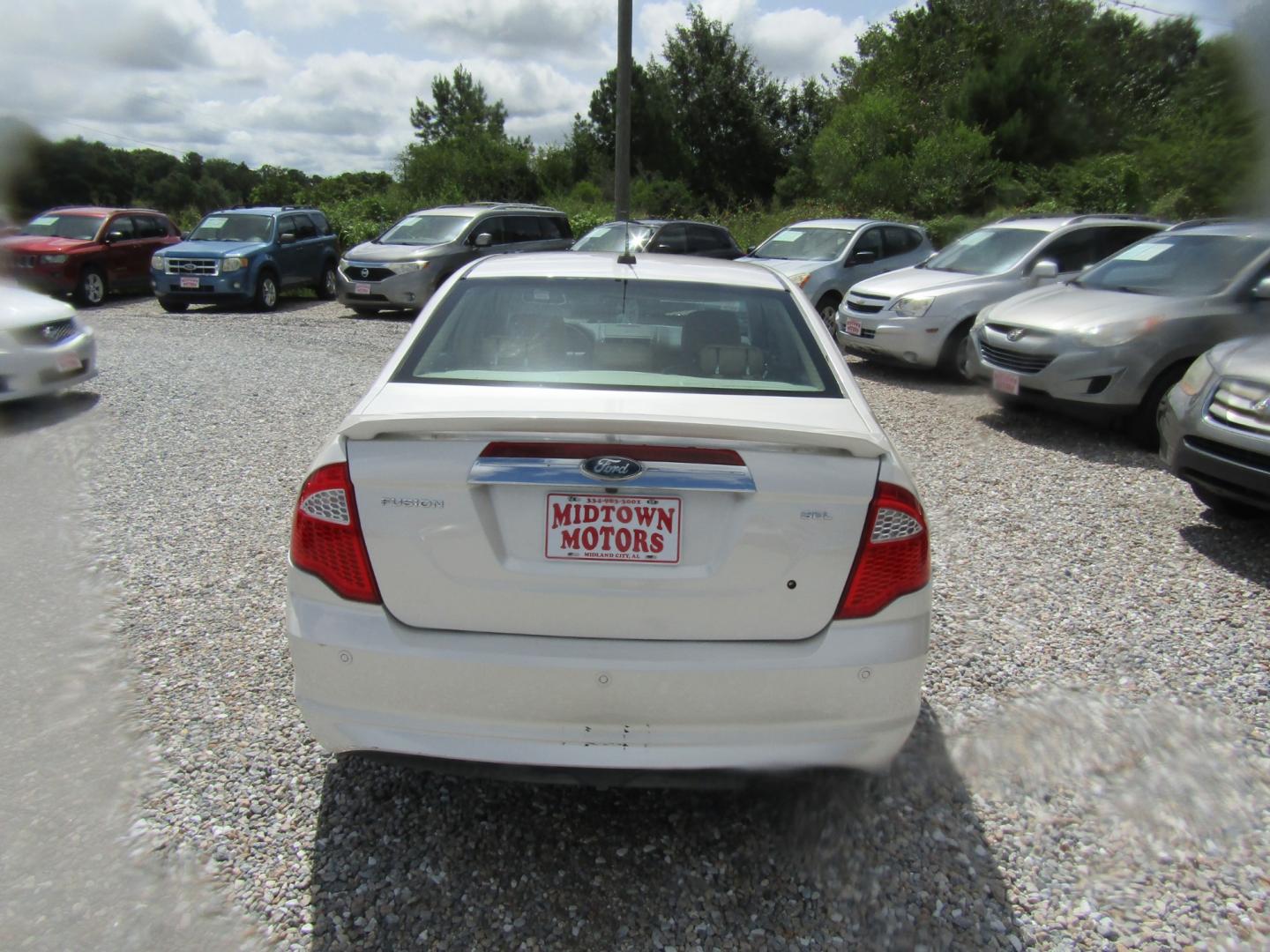 2012 White /Tan Ford Fusion SEL (3FAHP0JA4CR) with an 2.5L L4 DOHC 16V engine, Automatic transmission, located at 15016 S Hwy 231, Midland City, AL, 36350, (334) 983-3001, 31.306210, -85.495277 - Photo#6